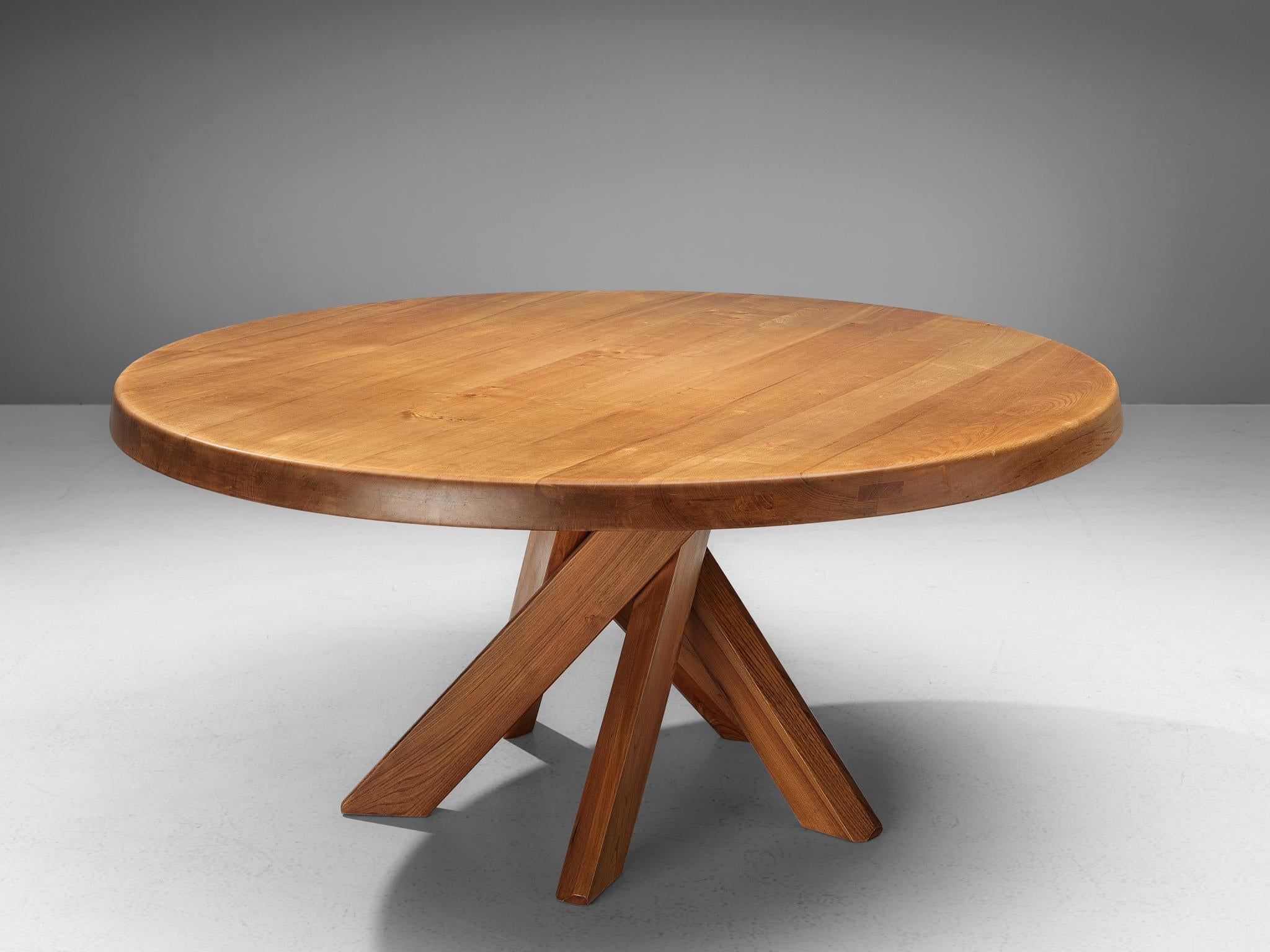 Pierre Chapo, T21E 'Sfax' dining table, elm, France, 1960s. Measures: Diameter 160cm/63in.

This round dining table is designed by Pierre Chapo. The shape of the base creates a very dynamic look. The perfectly made solid wood joints, also shown on