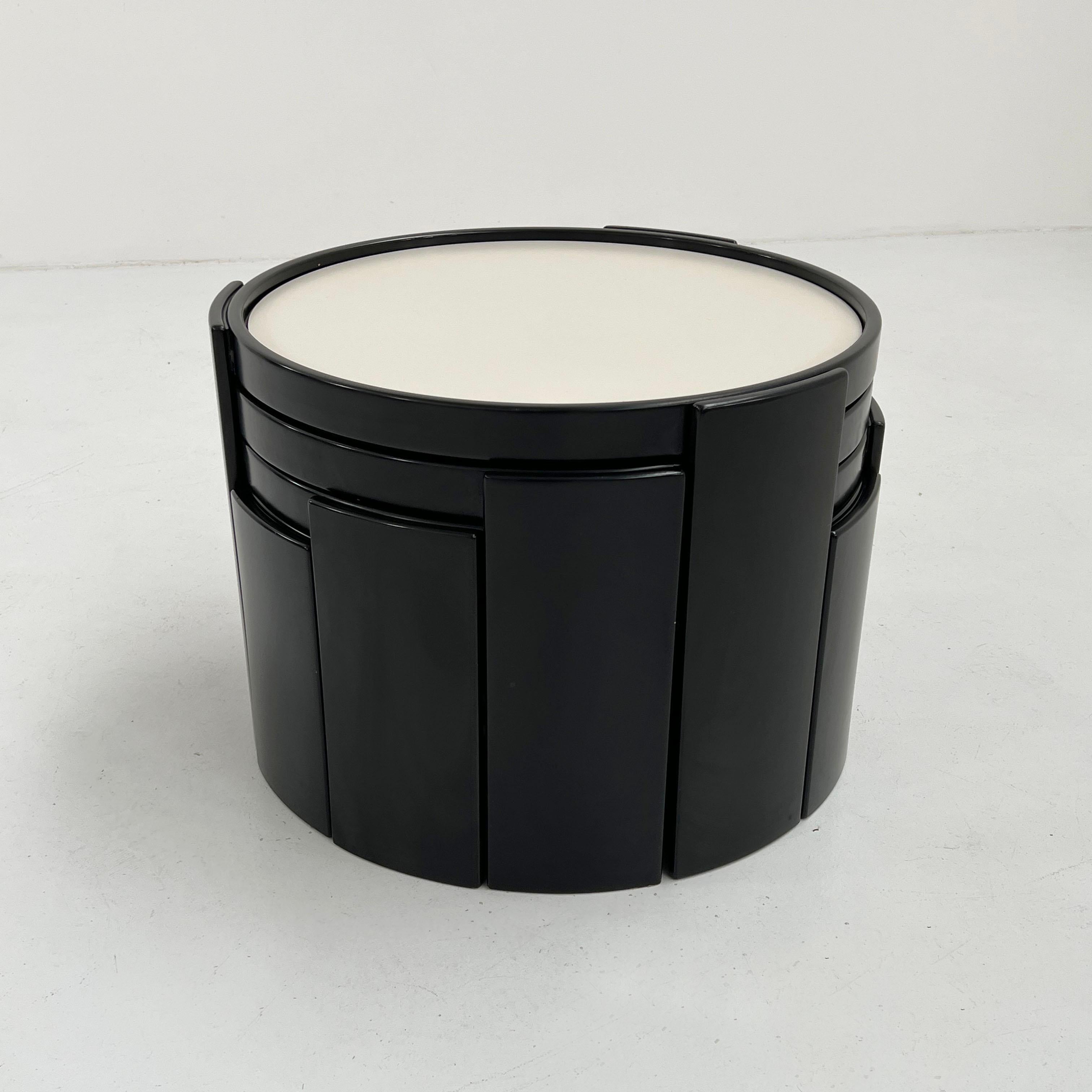 Designer - Gianfranco Frattini
Producer - Cassina 
Model - Model 780 Nesting Tables 
Design Period - Sixties
Measurements - Width 61 cm x Depth 61 cm x Height 44 / 39 / 34 / 29 cm
Materials - Wood, Laminate
Color - Black & White 
Comments - Light