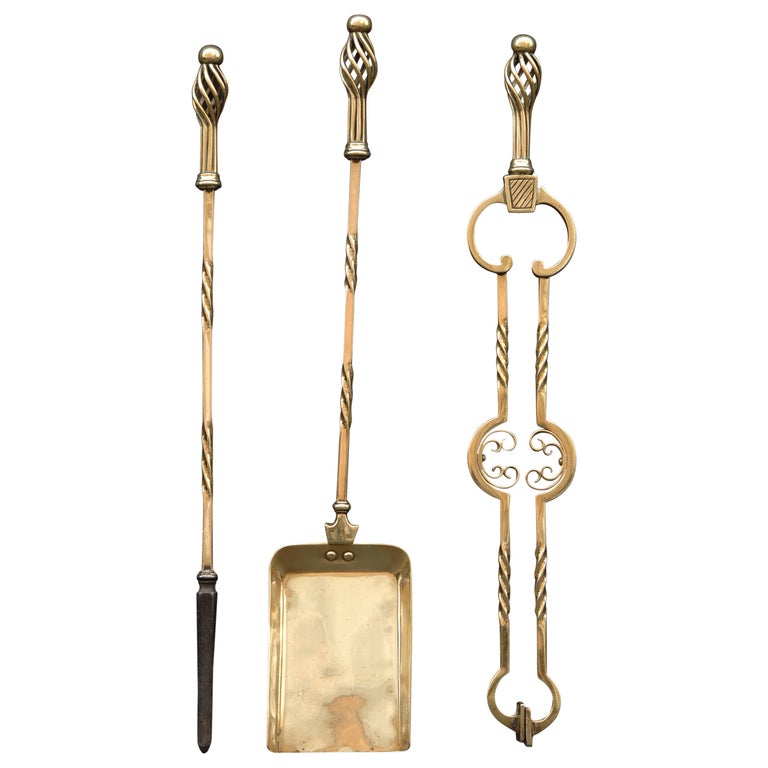 Arts and Crafts set of brass fire tools, late 19th century, offered by Thornhill Galleries