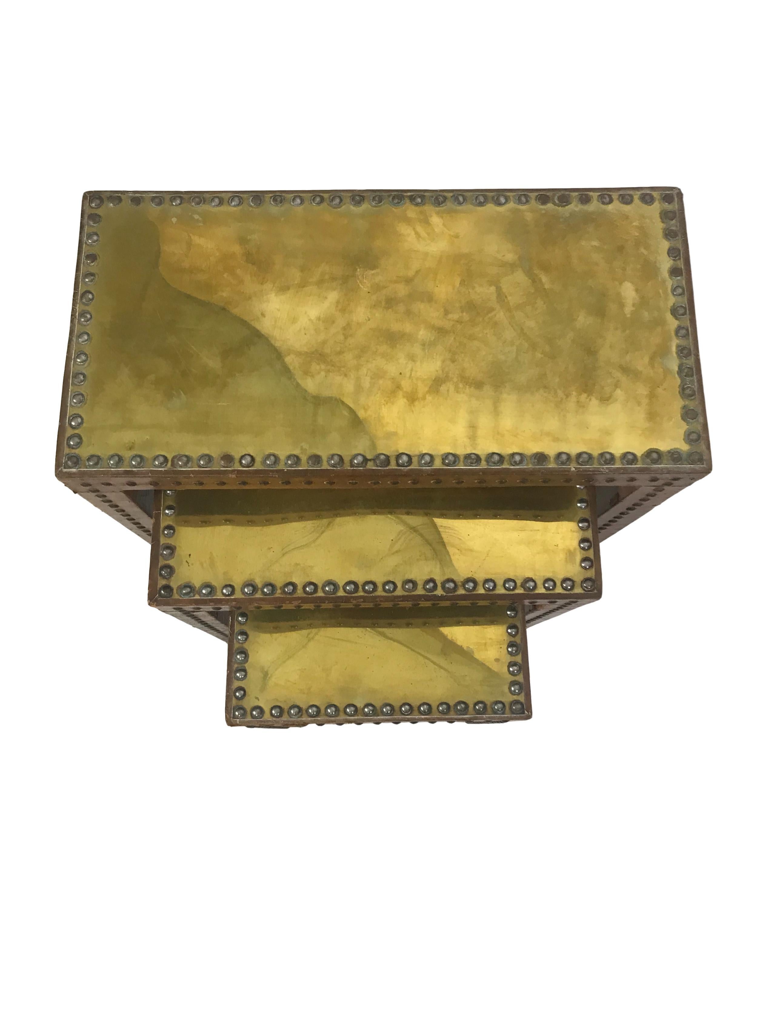 Mid-20th Century Set of Leather Wrapped Nesting Tables with Brass Tops and Brass Tack Detail