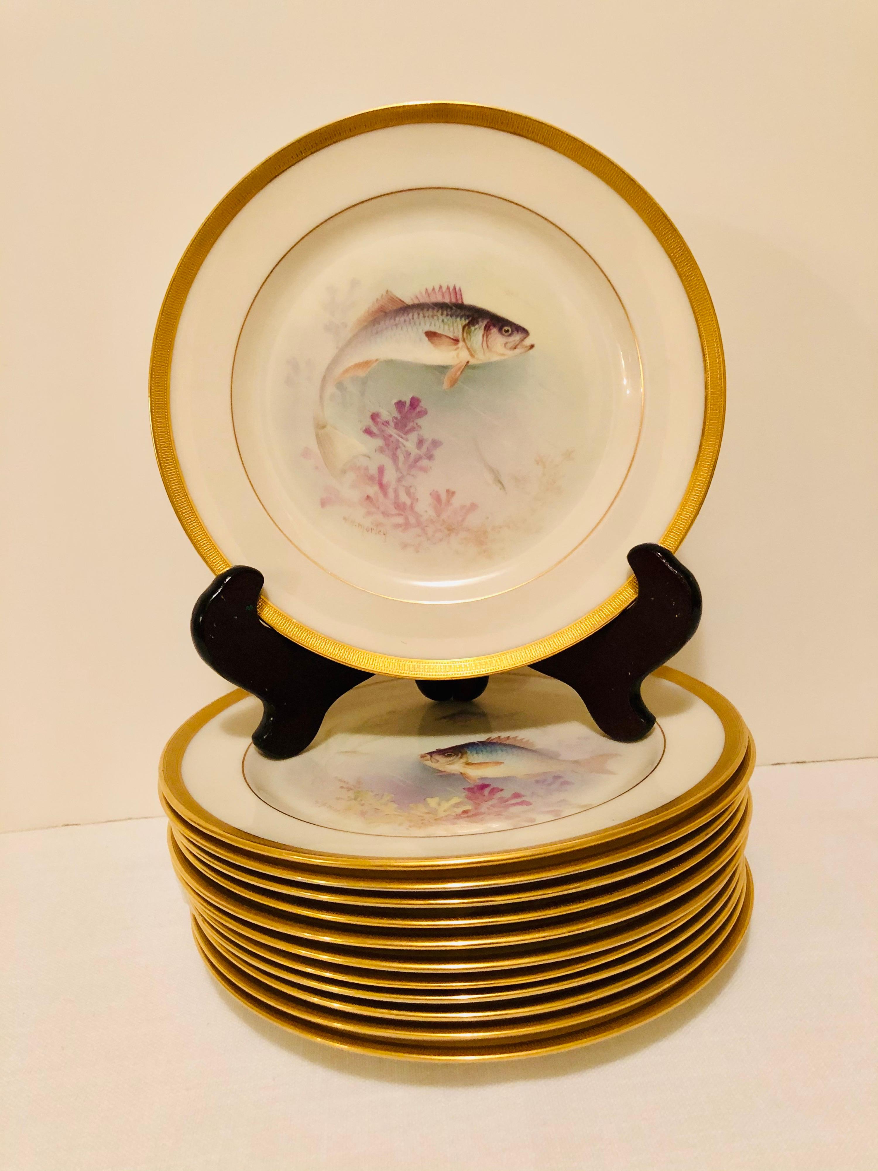 I am offering you this outstanding set of twelve antique Lenox fish plates, each painted with different fish artist signed W. H. Morley. Morley was one of Lenox's most talented artists. He specialized in painting roses, orchids, birds and fish. Each