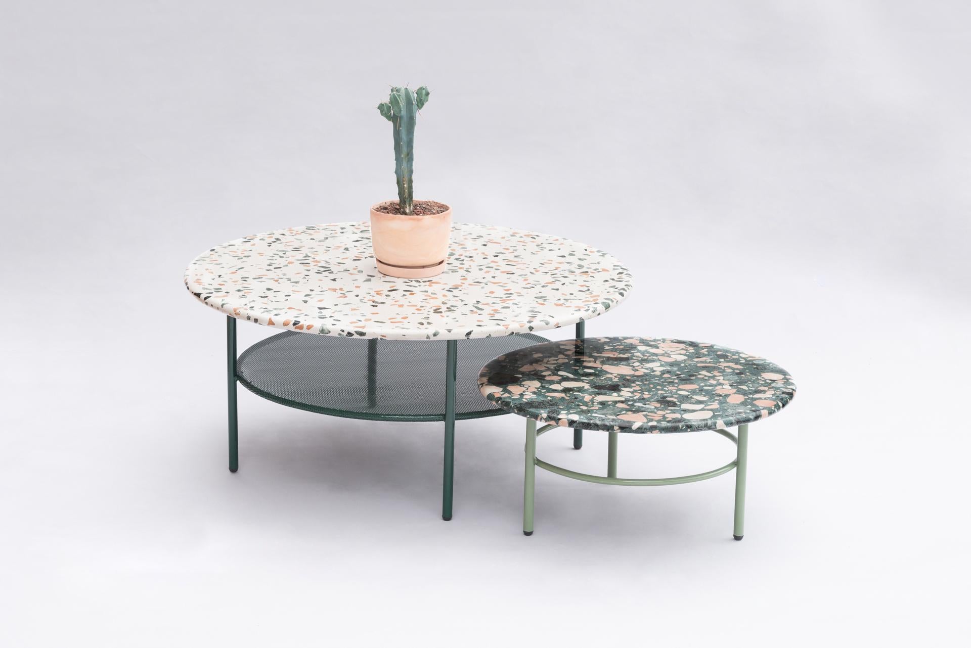 This fresh and colorful coffee tables are ideal for outdoors although they combine perfectly with modern and fresh interiors as well. Their Terrazzo top is a mixture of colored cement and marble stones. There are two versions of Terrazzo that can be