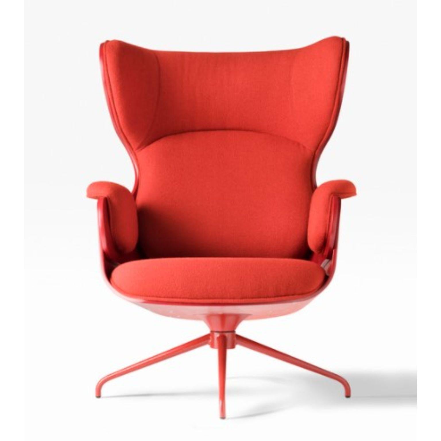 red armchair and footstool