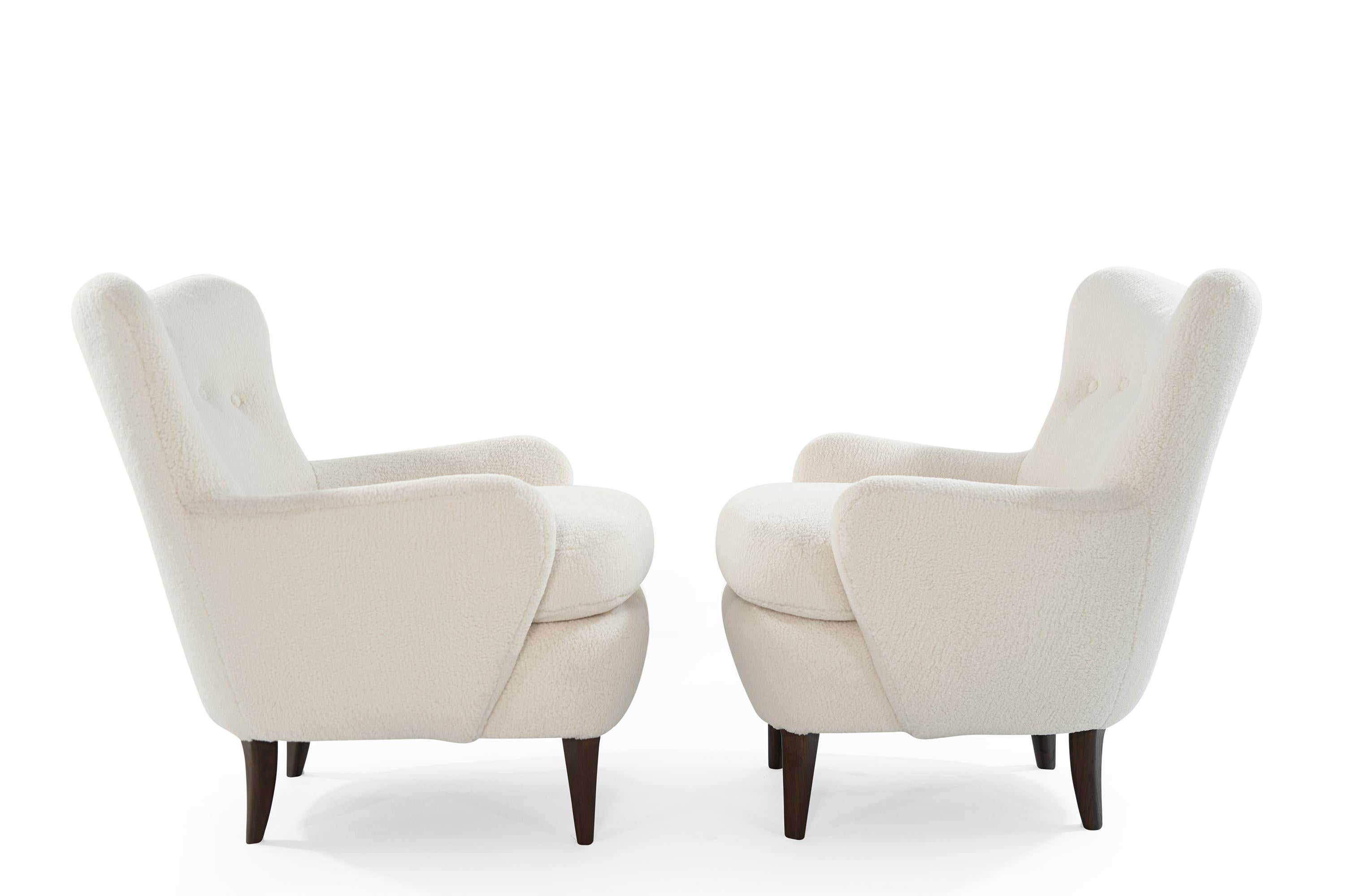 A rare set of lounge chairs by the distinguished Austrian architect and interior designer Ernst Schwadron, circa 1950s. 

The mahogany legs have been fully restored to their original espresso finish. Newly upholstered in plush wool by Kravet.