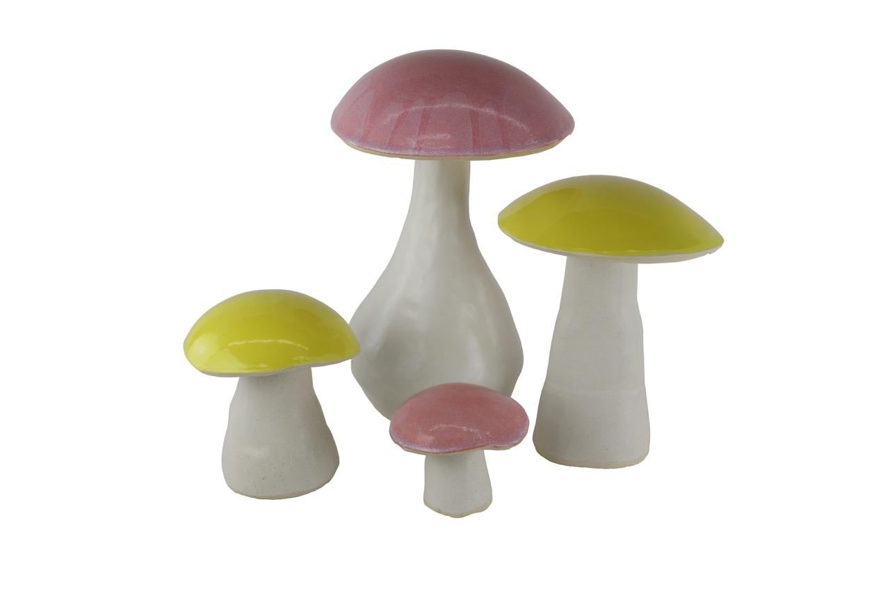 The Magic Mushrooms come as a set of four.  Each mushroom is handmade and unique.  You will receive a set similar to what you see pictured, but the stems will vary in size and shape because they are one of a kind.  The Magic Mushrooms are made of
