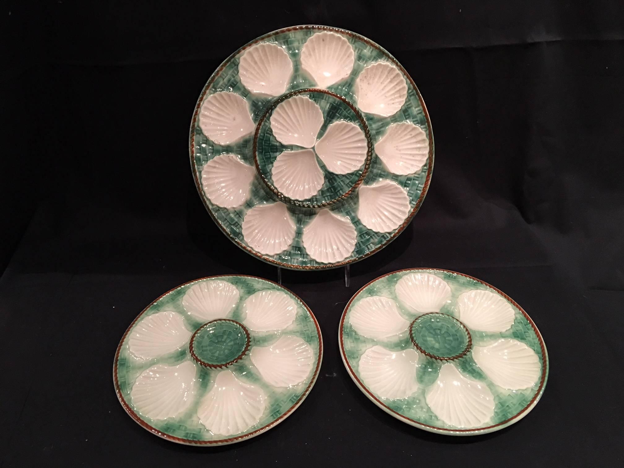 Set of majolica long champ eight oyster plates and a platter, 19th century. Dinner plates are 9.5
