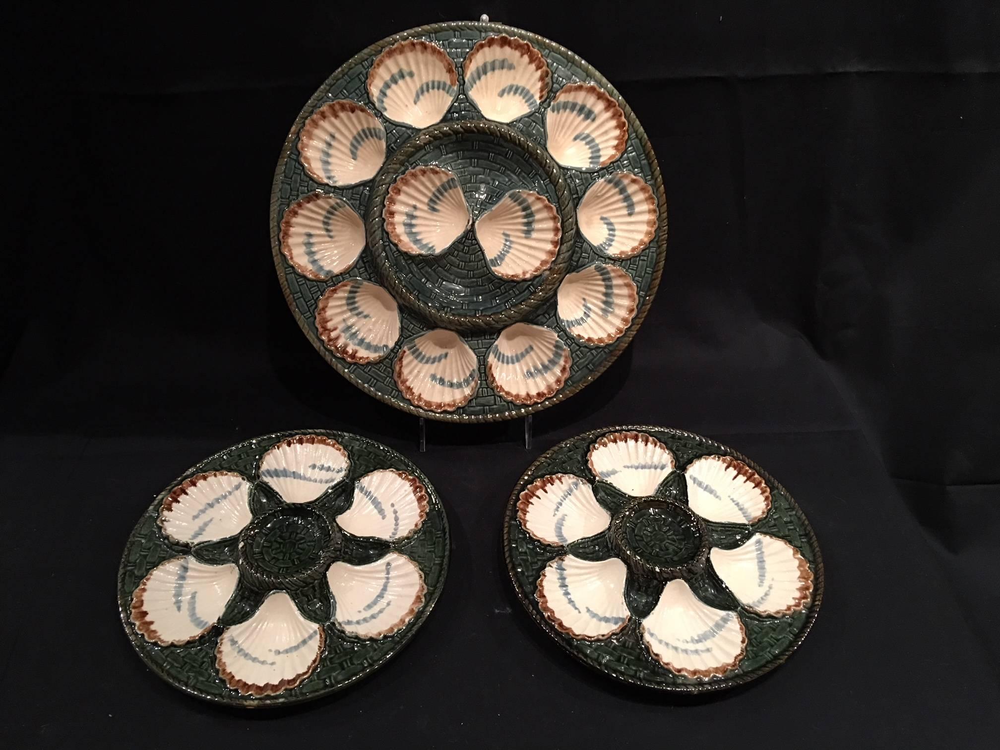 Set of Majolica long champ six oyster plates and a platter, 19th century. Plates are 9.5