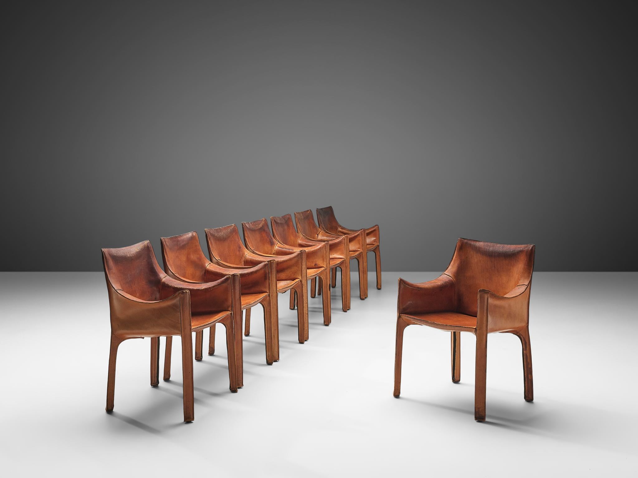 Mario Bellini for Cassina, set of eight cab 413 armchairs, Italy, 1979.

Conceptually, the chair was designed to become marked and shaped over time by its user. The leather skin fits like a glove over the steel skeleton and fastens with four zips.