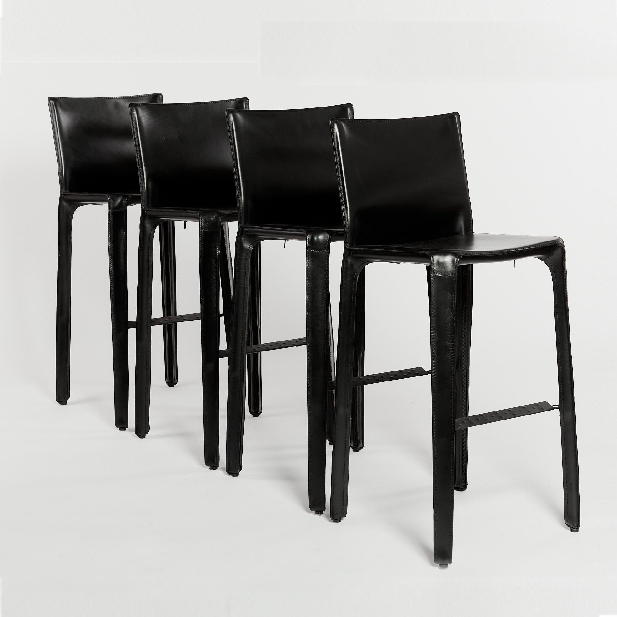 Mario Bellini CAB bar stools in black leather. Includes original labels and embossed logo on the base.

Made with a lengthy thinning process of the leather, the cut parts are stitched together, while the upholstery is hand-fitted to the steel