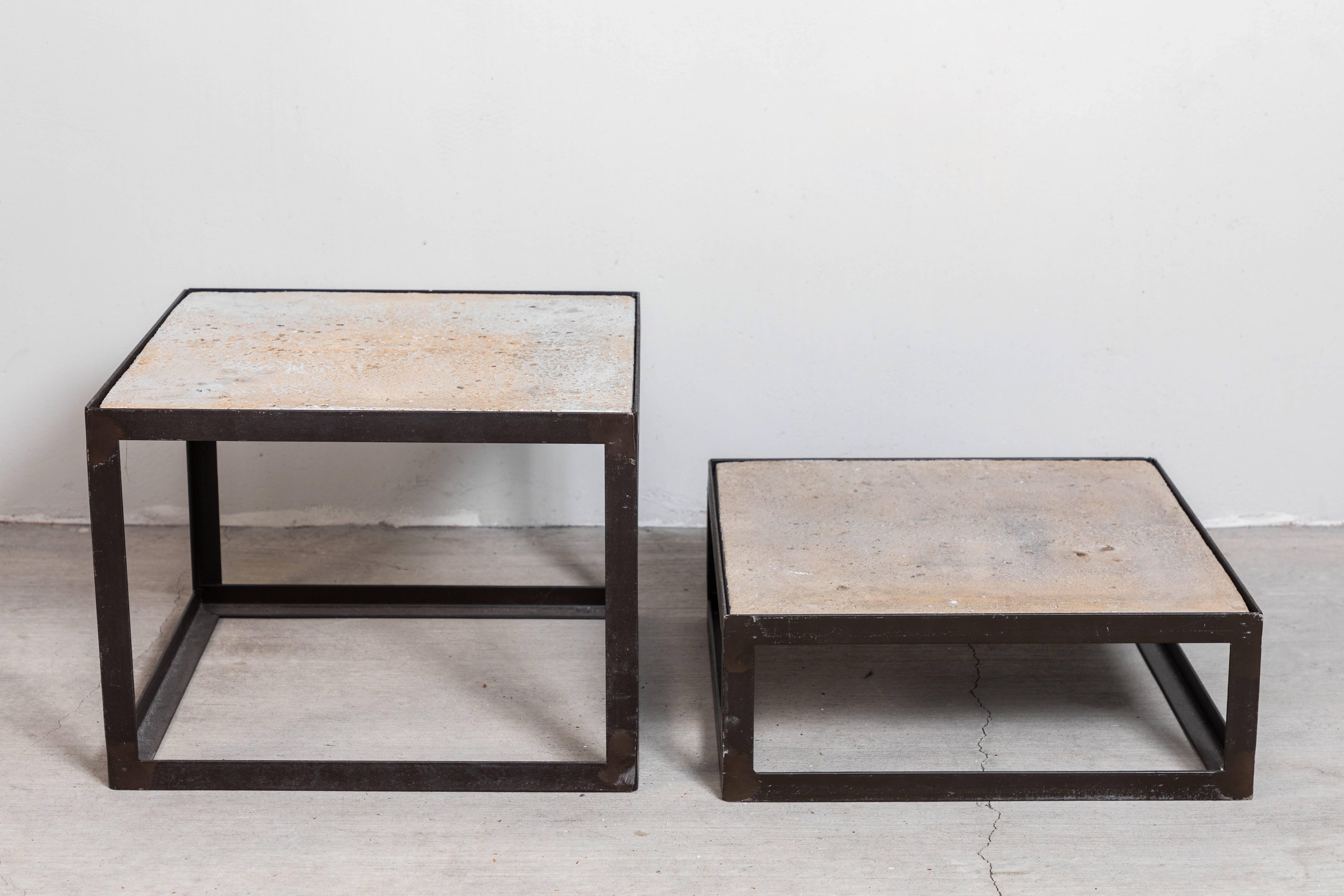 Chic set of low, square metal table with travertine tops, late 1970s-early 1980s. The tables can be used together or separately and be configured in a variety of ways to create interesting combinations.