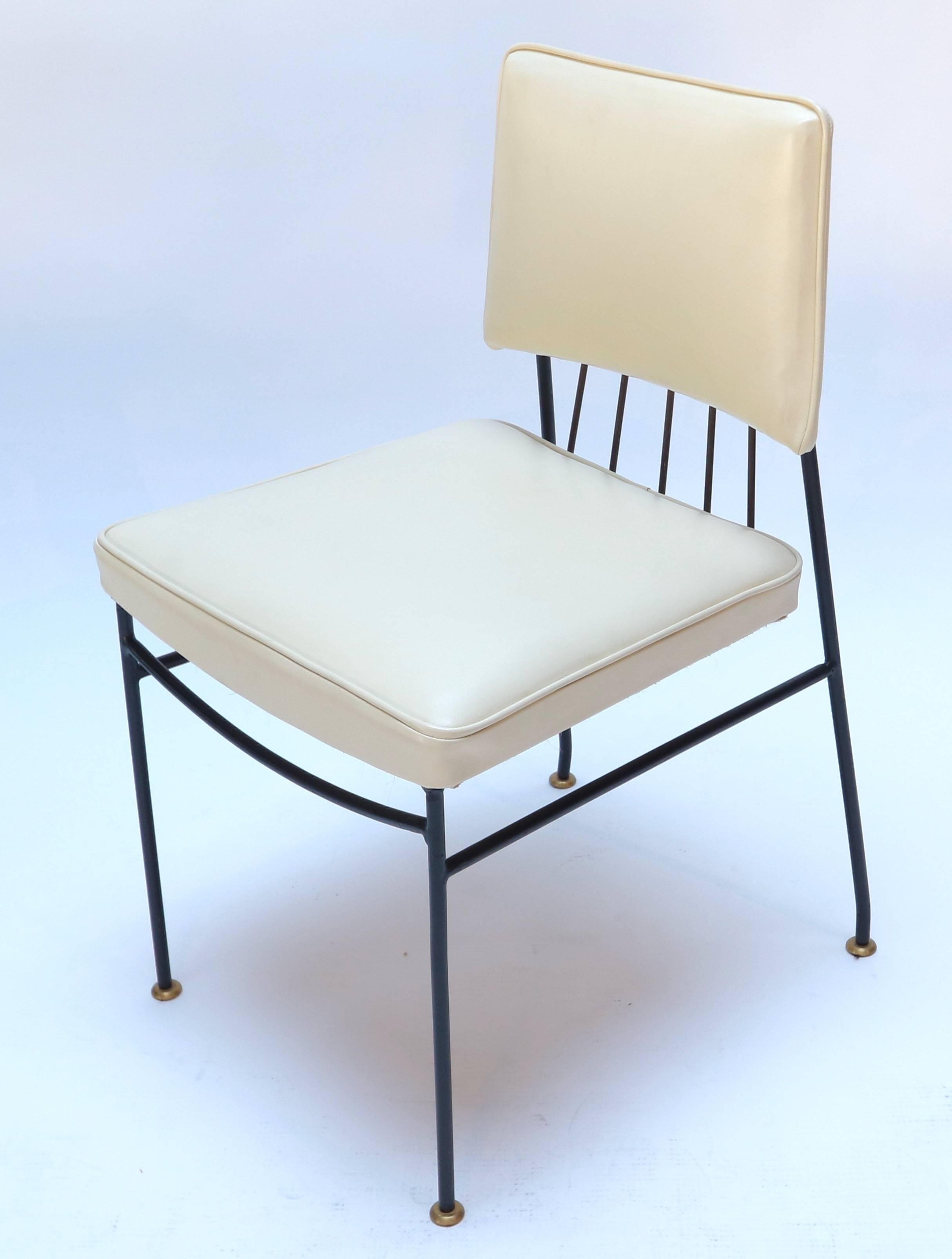 Set of four dining chairs by Arturo Pani from the 1960s upholstered in cream leather on a metal frame with brass back and feet.
Measure: seat depth 16