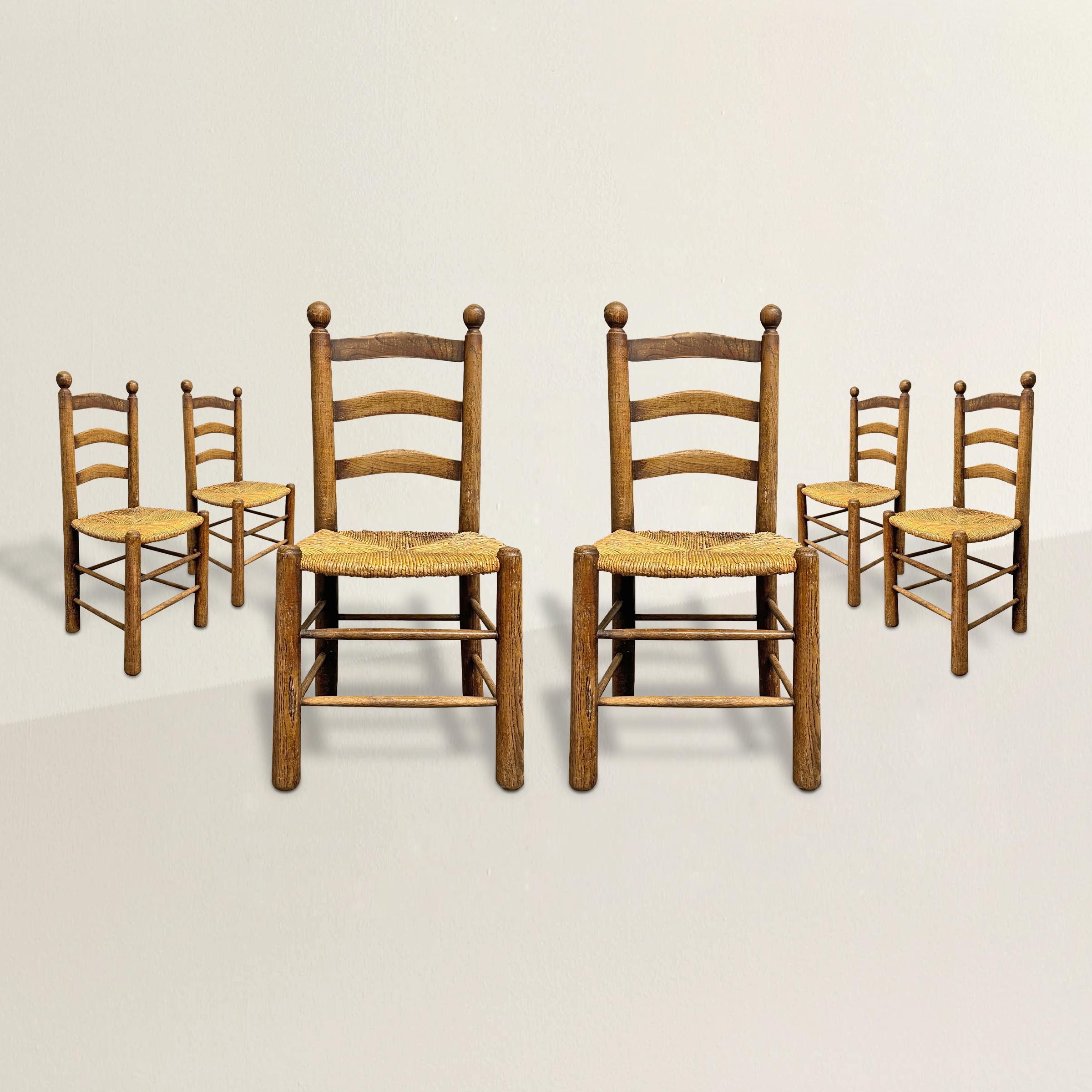 Evoke the timeless allure of Charles Dudouyt's design legacy with this captivating set of six French oak and rush ladder back dining chairs, meticulously crafted in the Dudouyt style. Embracing the essence of Art Deco and Modernist influences, each