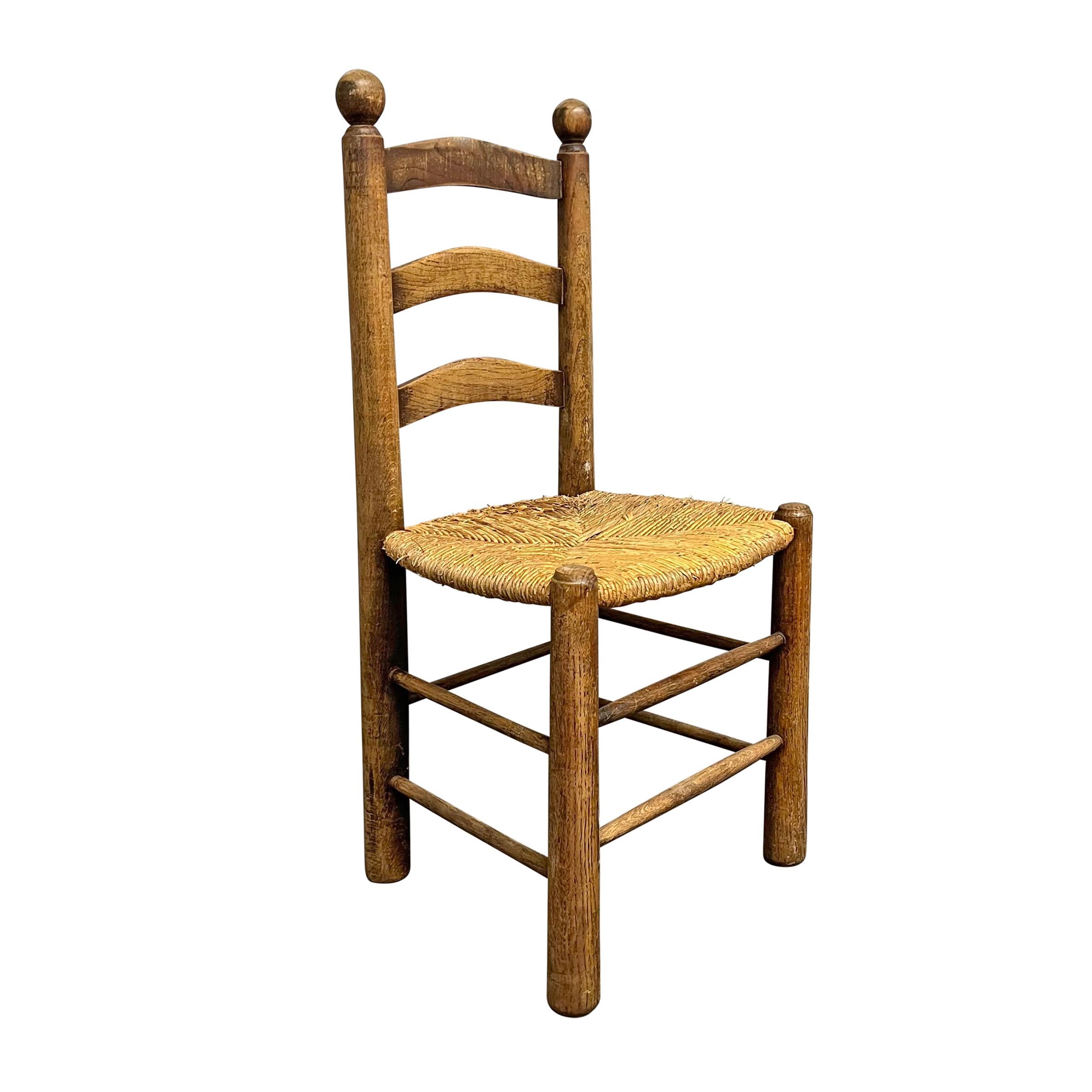 Set of Mid-20th Century French Oak and Rush Dining Chairs In Good Condition In Chicago, IL