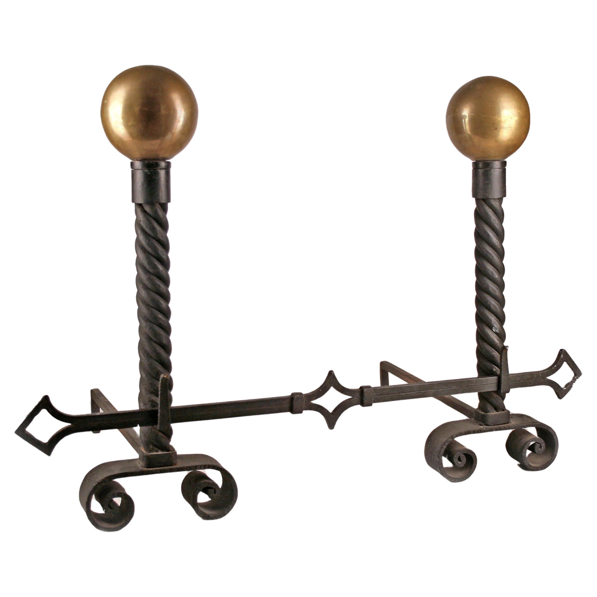 Set of Mid-20th Century Modern Wrought Iron Gilted Andirons by Gilbert Poillerat For Sale
