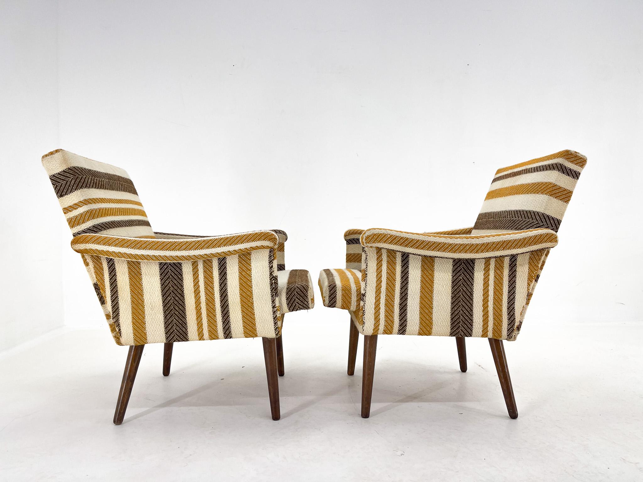 Pair of fabric and wood vintage armchairs with original upholstery. Suitable for reupholstering.