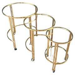 Set of Mid-Century Modern Brass & Glass Rolling Nesting Tables