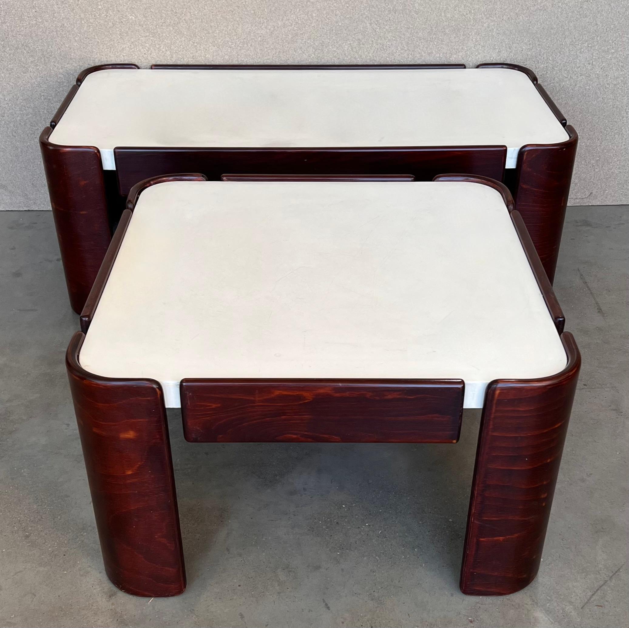Elegant pair of mahogany coffee tables with white top in style of Afra & Tobia Scarpa for Cassina. 

Rectangular table : 
Height: 14.85 in (37.7 cm)
Width: 41.34 in (105 cm)
Depth: 21.74 in (55.2 cm).