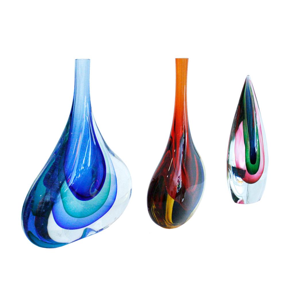 Set of three Murano hand blown vases made in Murano glass by the Italian artist glassblower Flavio Poli, Italy, 1980s.

These exquisite Venetian vases are made with one of the most common techniques, “Sommerso”, which in Italian literally means
