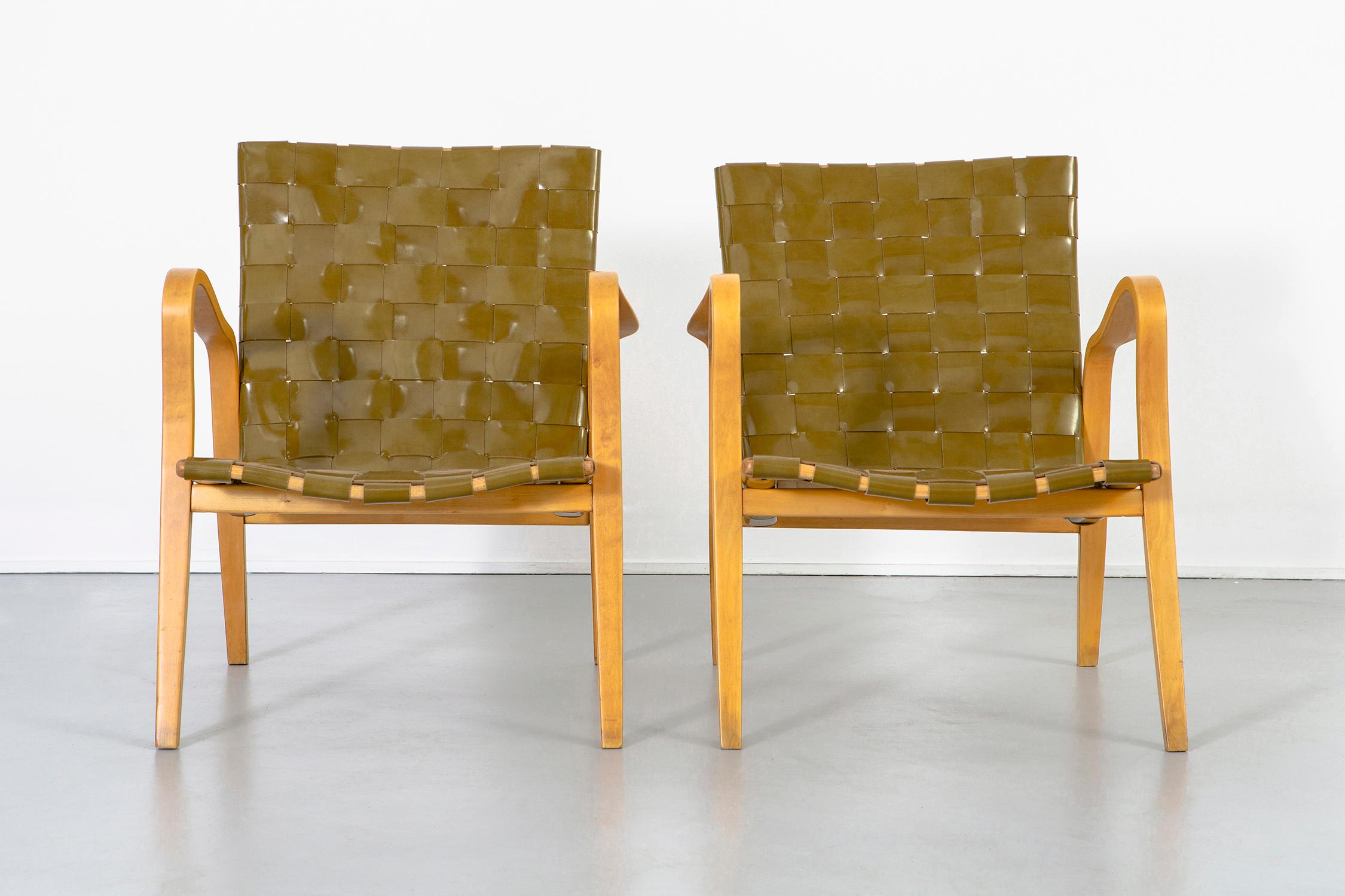 Set of two armchairs

Designed by Gustav Axel Berg

Sweden, circa 1940s

Birch and patent leather

Measures: 29 ?” H x 24 ¾” W x 26 ?” D x 14 ?” seat H

Fresh webbing in patent leather over the original birch frames.