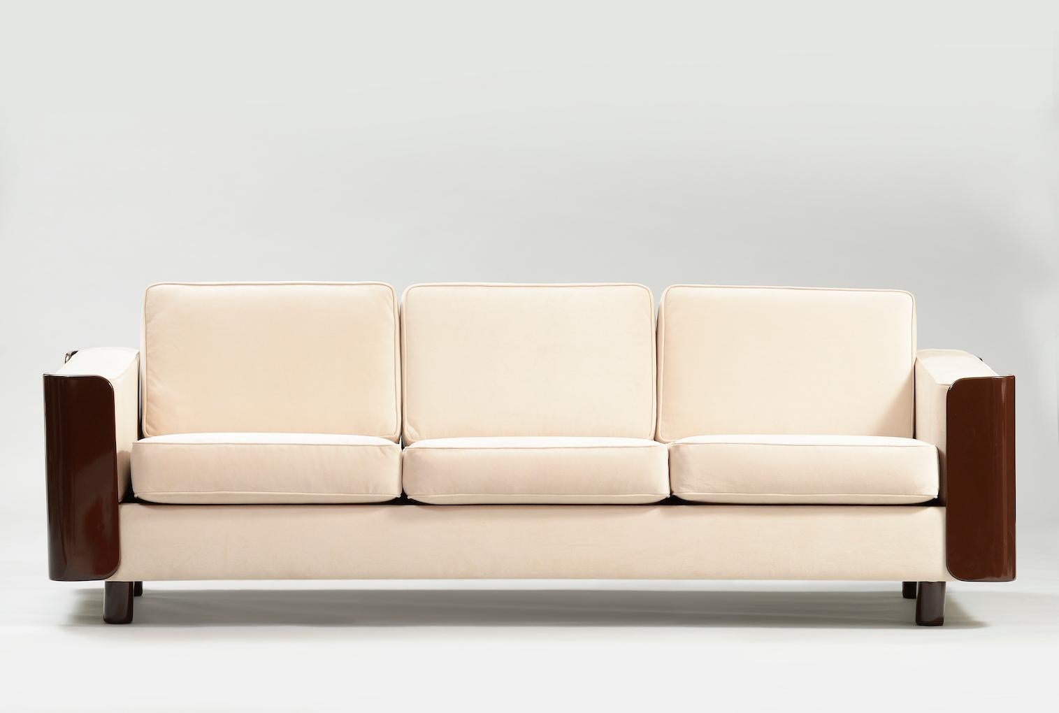 Brown lacquered three-seat Mid-Century Modern sofa re-upholstered in a ivory color velvety fabric with the matching armchairs.
The pair can be sold separately.
Sofa: H. 70 cm (back), D. 82 cm, W. 202 cm
Armchair: H. 70 cm (back), D. 82 cm, W. 88