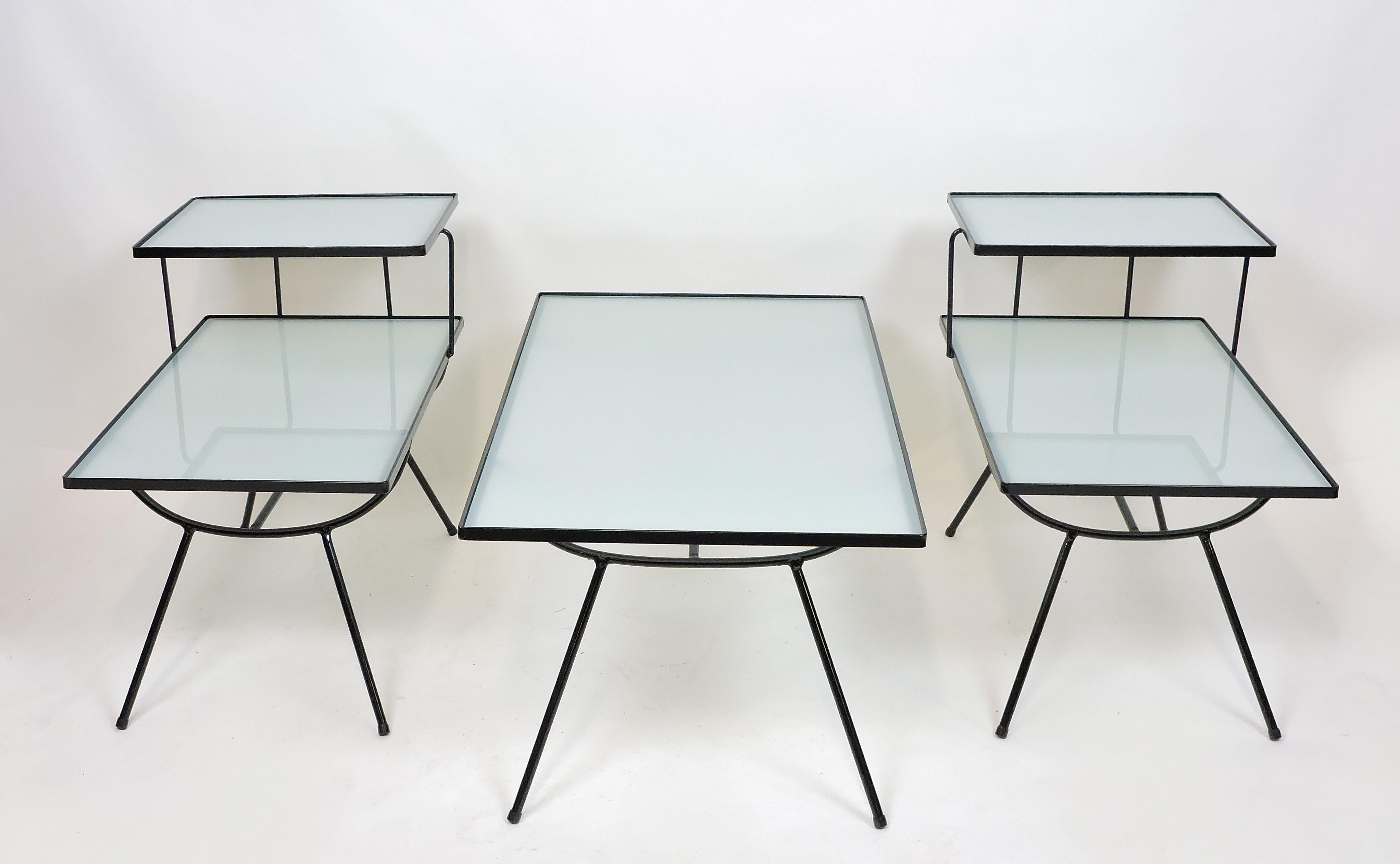 Beautiful set of three tables by Frank and Son in the style of George Nelson. This set includes a coffee table and two end step tables that have a clean, architectural style. These have been newly powder coated for a durable finish with all new
