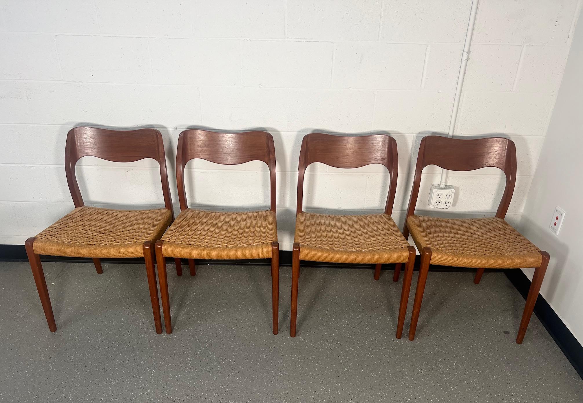 This is a spectacular set of 6 Danish teak dining chairs Niels Moller Model 71. Including 2 with arms Model 55. Original manufacturer stamp underneath the chairs.

Very good vintage condition. Teak frames without cracks or loose joints. Some minor