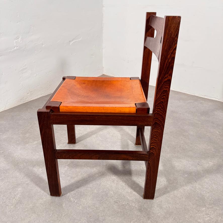 Set of Mid-Century solid Wengé chairs with Cognac saddle leather seats, 1960's 3