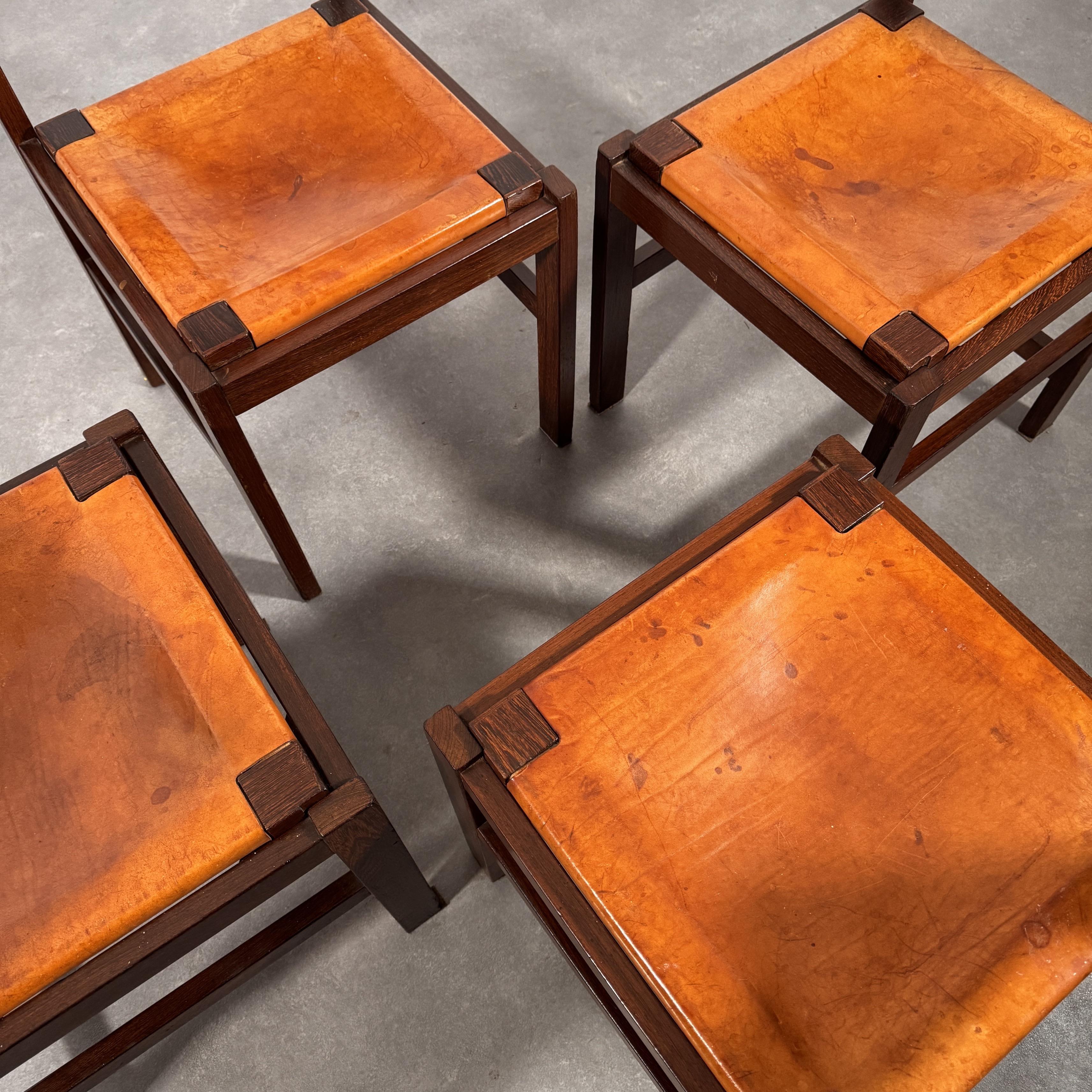 Dutch Set of Mid-Century solid Wengé chairs with Cognac saddle leather seats, 1960's