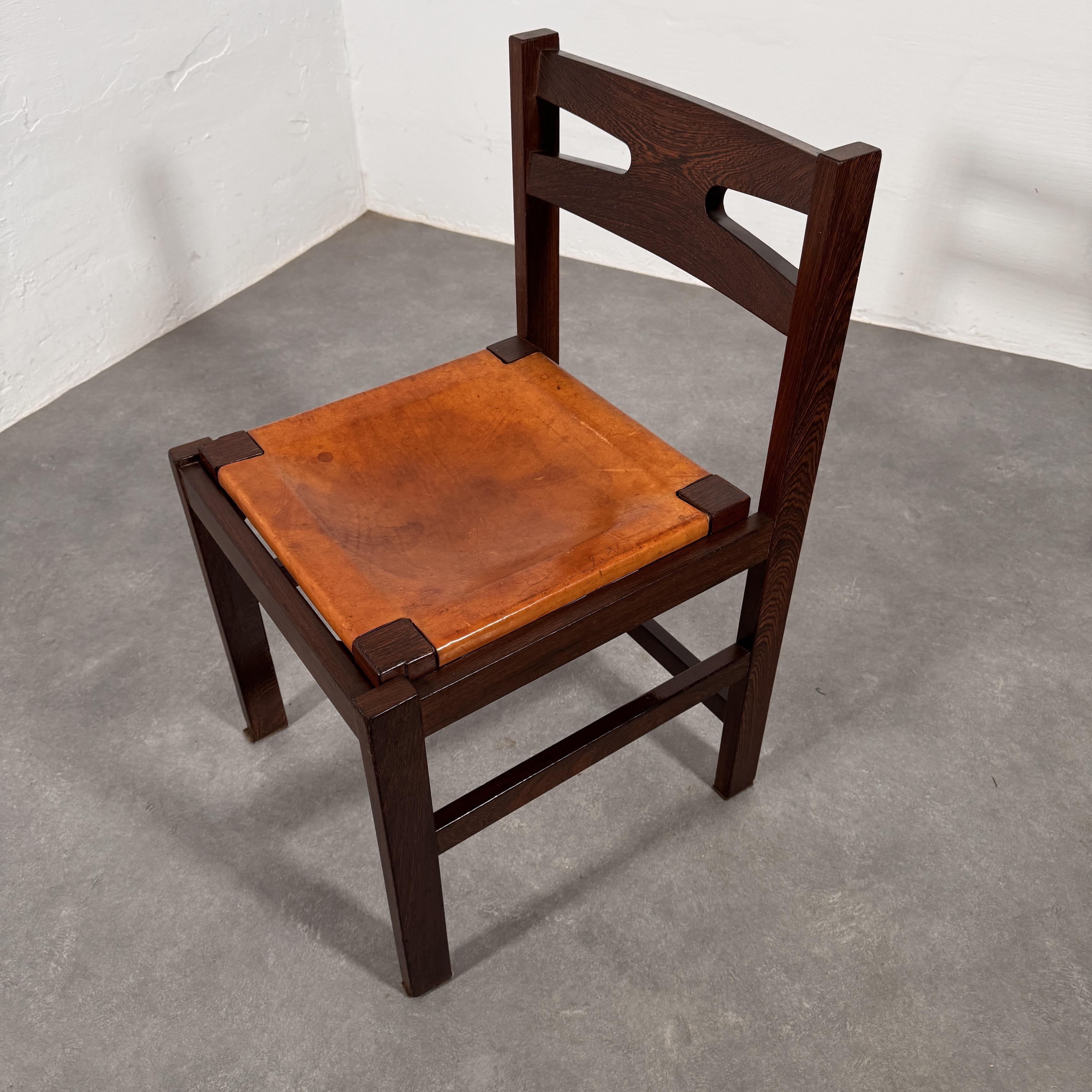 Mid-20th Century Set of Mid-Century solid Wengé chairs with Cognac saddle leather seats, 1960's