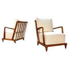 Set of Mid-Century spindle back cherrywood loungechairs.