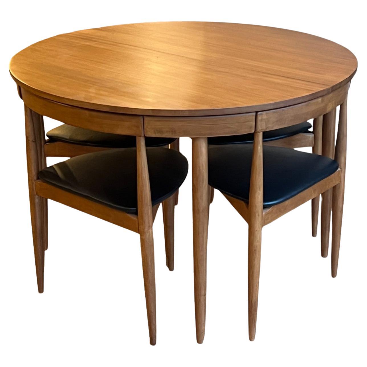 Rare Hans Olsen Teak Table with Leaf and Six Chairs That Tuck under