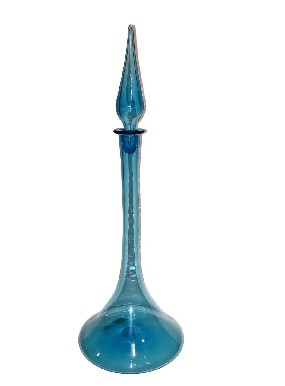A rare set of circa 1950's handblown blue Murano glass vases and decanter with stopper. Sold as set of three.

Measurements:
Decanter: 26