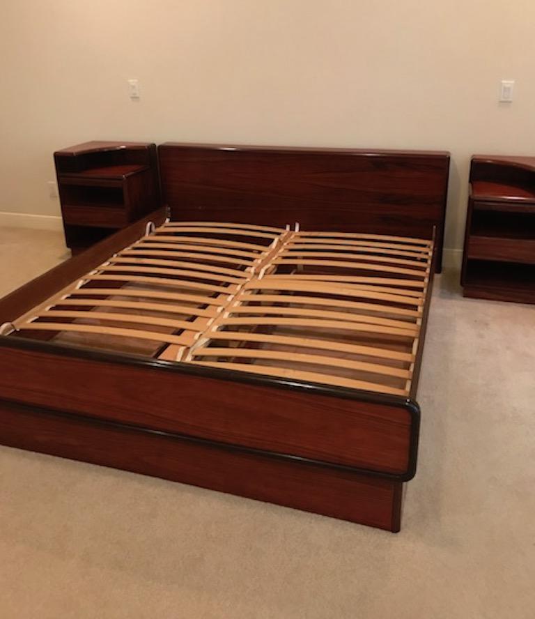 Bed is king size and is made out of rosewood. It has solid headboard and 2 extra storage drawers on the bottom.
Brauer Manufacture
Measures: 90” x 74” x 14” Sideboard is 30