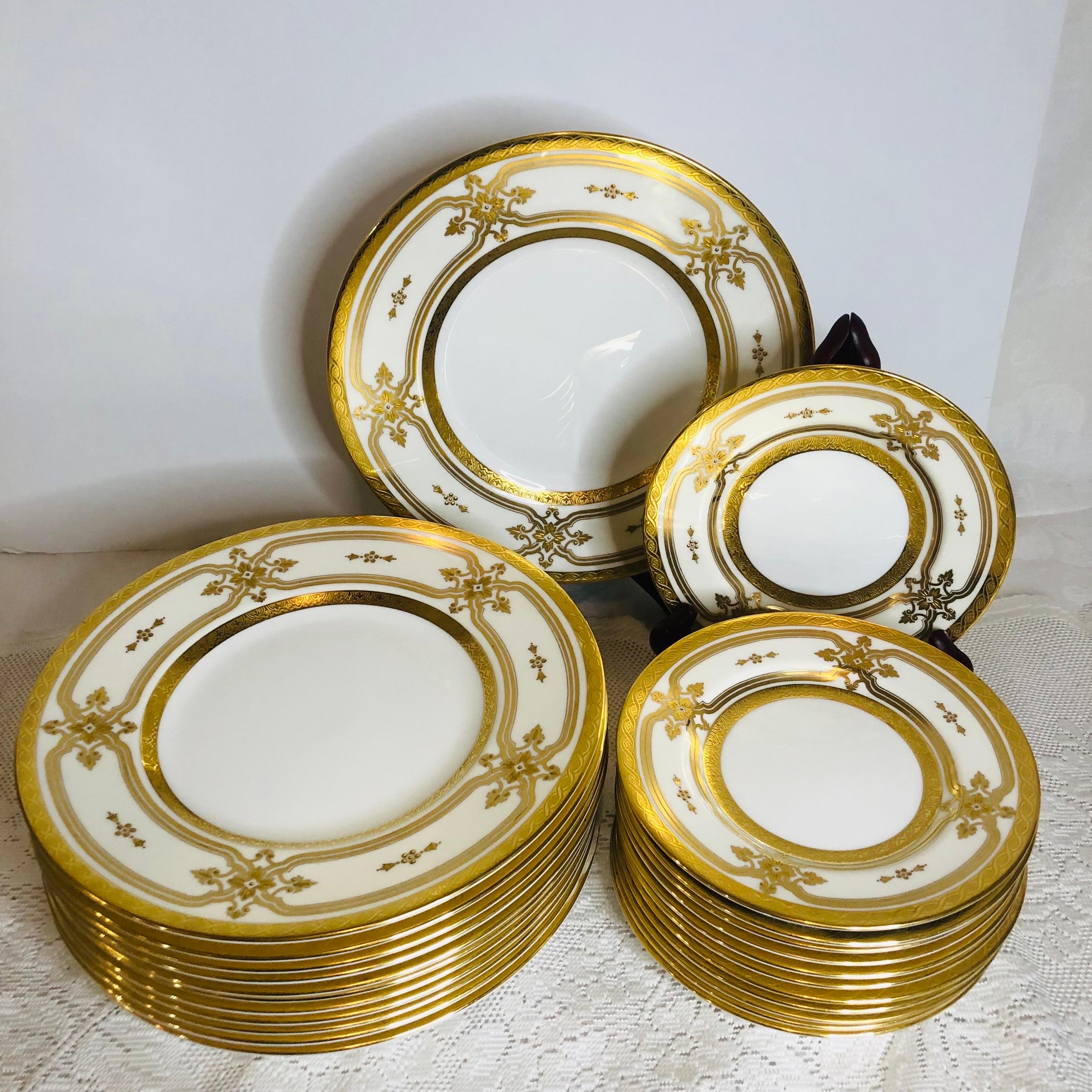 I am offering you this stunning set of Minton plates that were made exclusively for Tiffany and Company, New York. This set has 12 luncheon or dessert plates and 12 bread or appetizer plates. They are beautifully designed with a white background and
