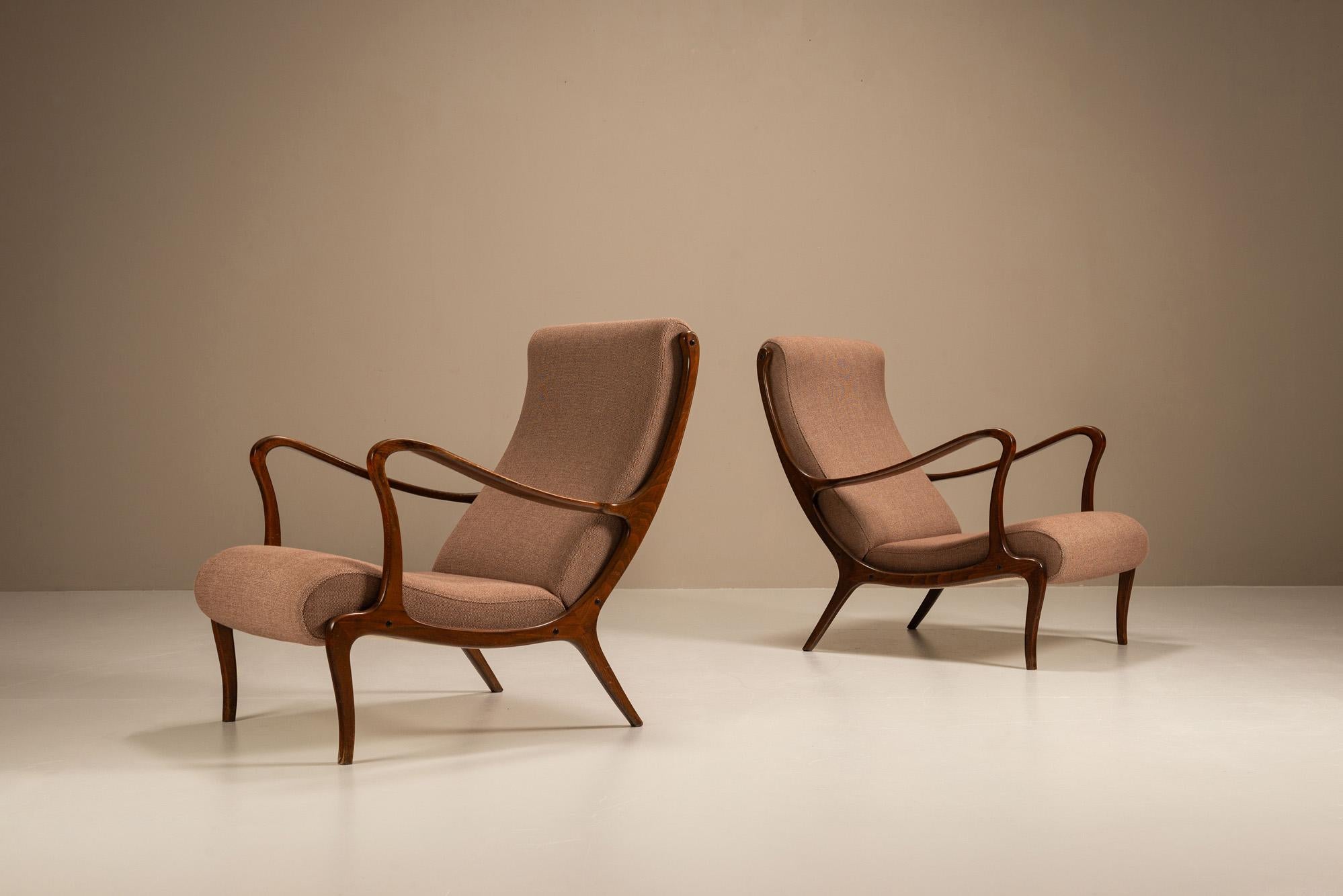 An elegant pairing of form and function, this rare set of ‘Mitzi’ lounge chairs by Ezio Longhi brings the sculptural sensibility of late 1950s Italian design into focus.

Design
Designed in 1958, the ‘Mitzi’ model reflects the era’s shift towards