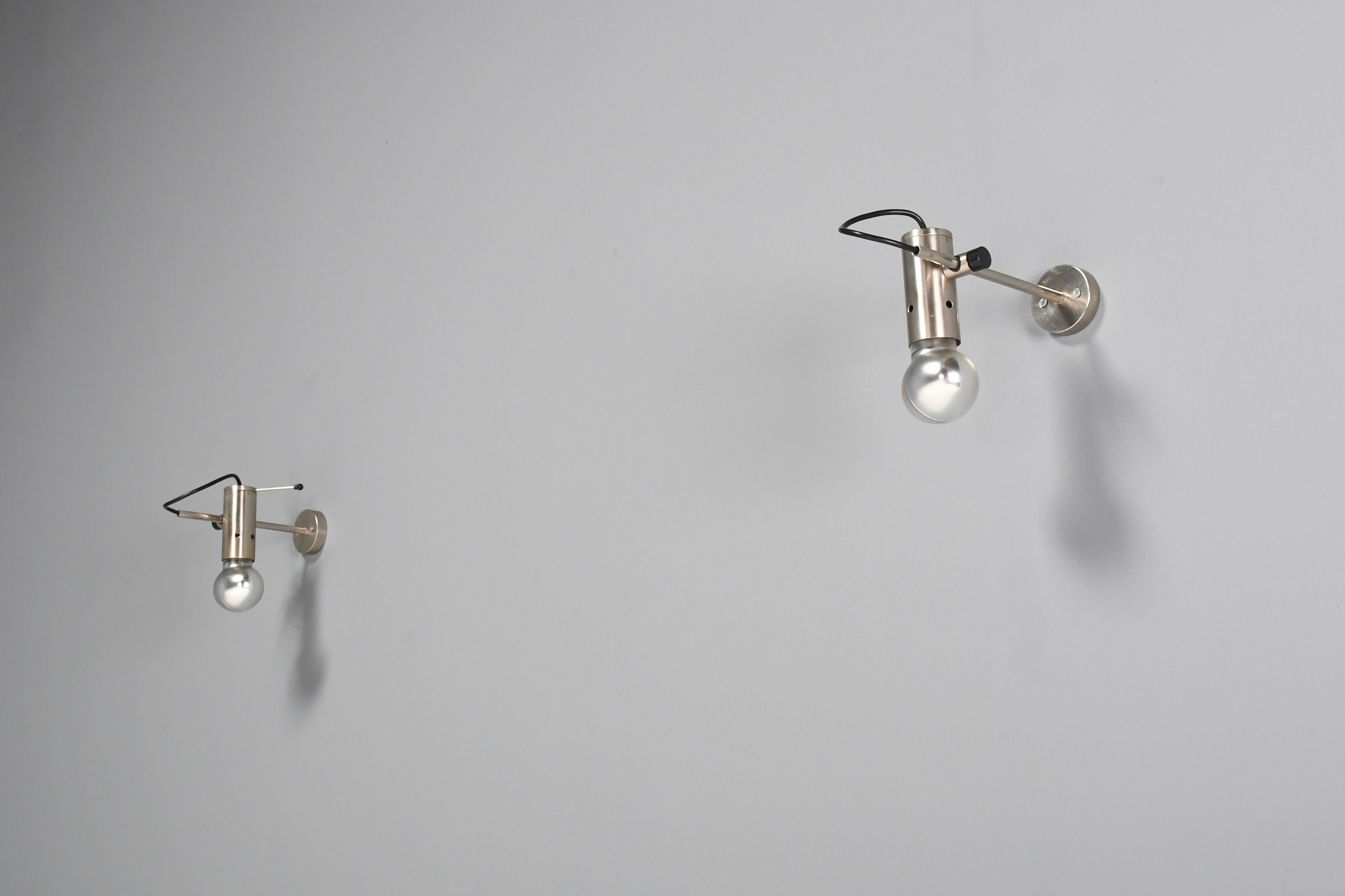 Original set of ‘Mod. 251’ sconces in very good condition.

Designed by Tito Agnoli in the 1960s

Produced by Oluce, Italy

The sconces are made from nickel plated brass with rubber details.

The lamp holder can be moved away and towards the wall by