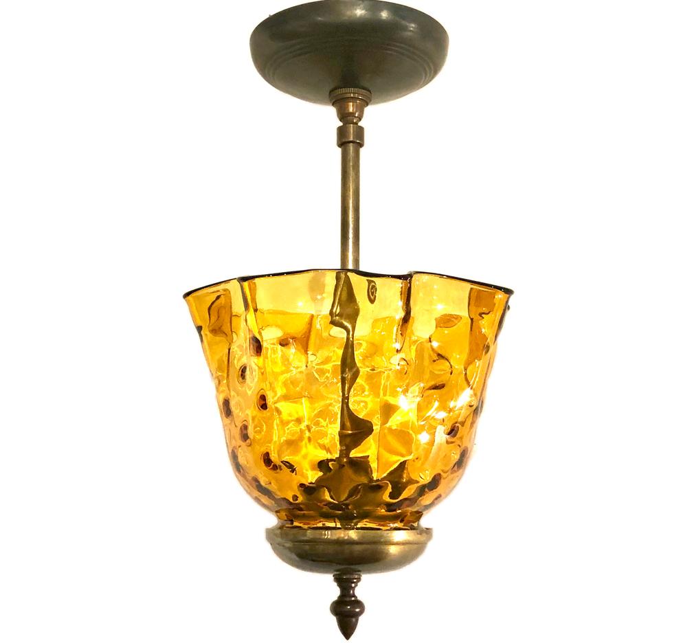 Mid-20th Century Set of Molded Amber Glass Light Fixtures, Sold Individually For Sale