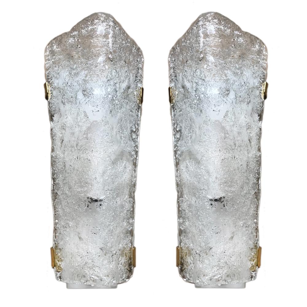 Set of 7 of circa 1960's Italian molded glass sconces with interior lights. Sold in pairs and one single.

Measurements:
Height: 13.5″
Width: 6.5″
Depth: 4″