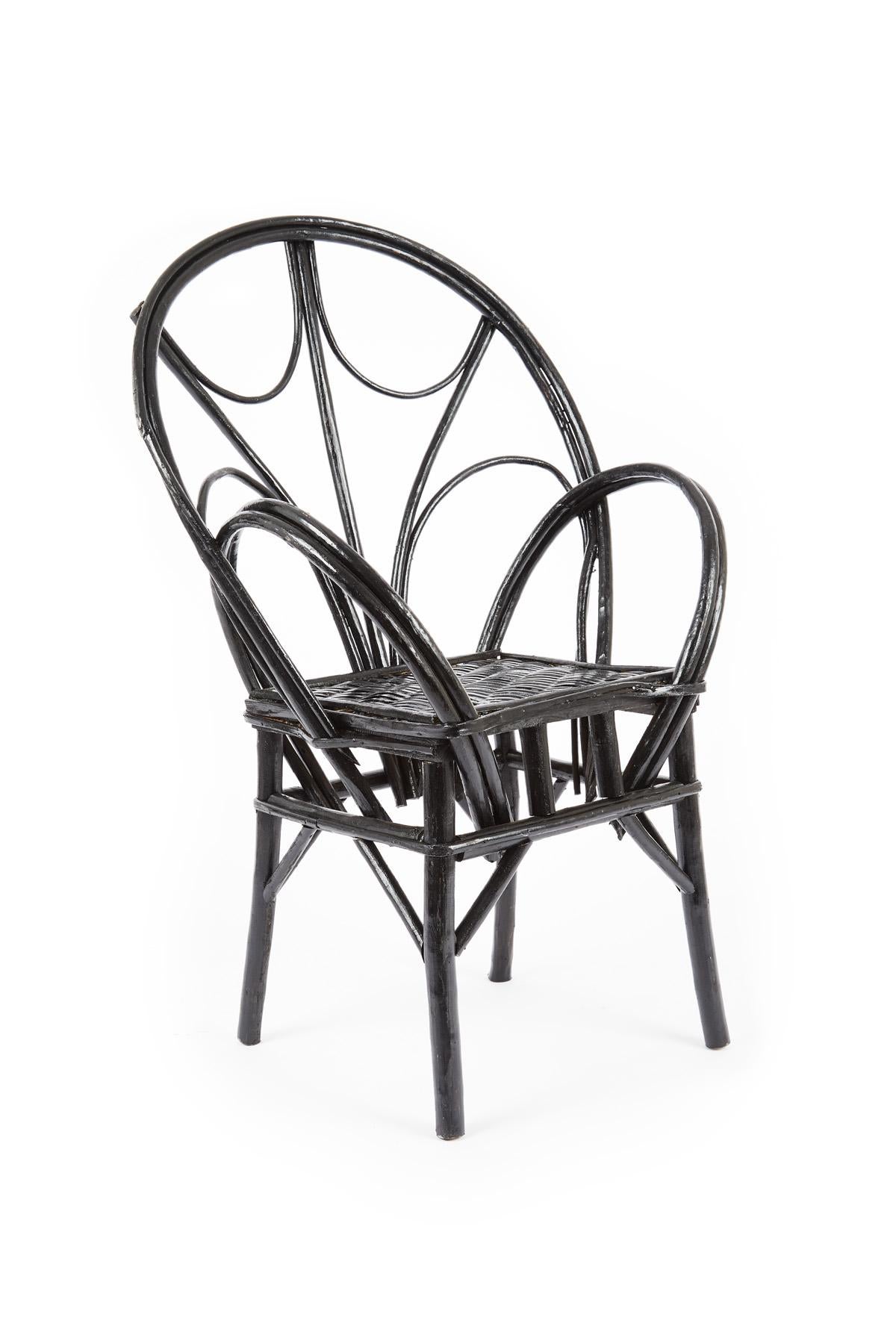 Set of wicker chairs handmade in Morocco with natural wicker and painted in black. 
