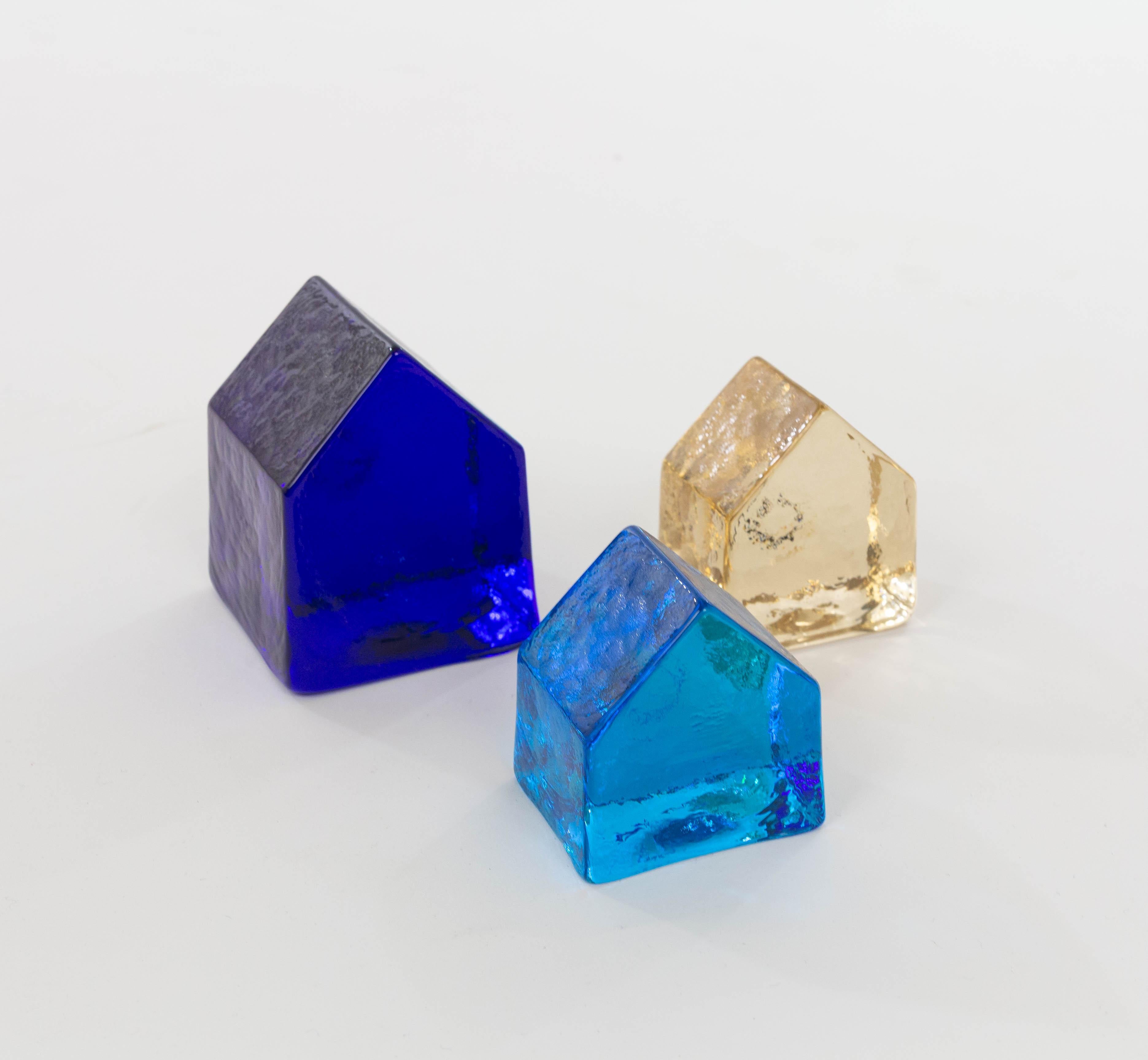 Carlo Nason designed these objects in the 1970s for V.Nason&Co, the company of his father Vincenzo Nason.

They are made of Murano glass in three striking colours. The items could be used as decorative objects or as paperweights.

This set consists