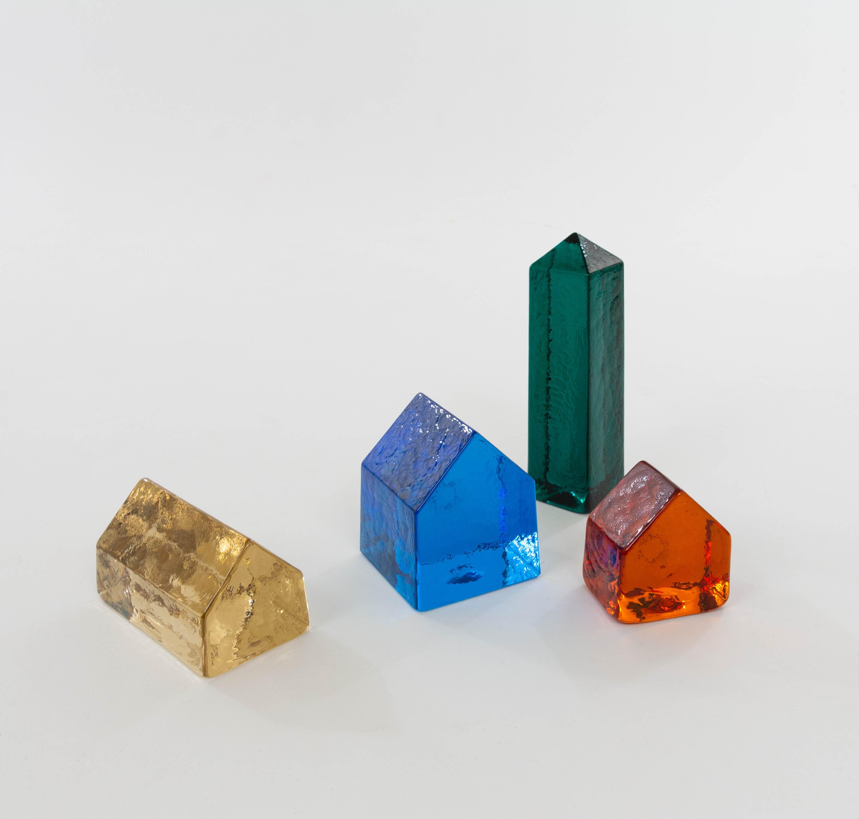 Carlo Nason designed these objects in the 1970s for V.Nason&Co, the company of his father Vincenzo Nason.

They are made of Murano glass in four striking colours. The items could be used as decorative objects or as paperweights.

This set consists