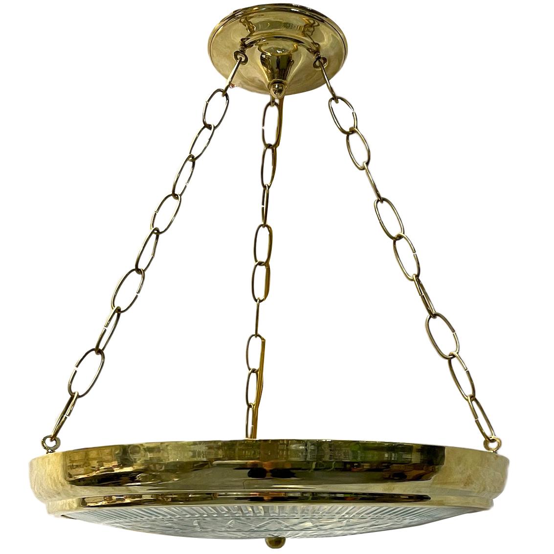 Set of six circa 1940s French gilt and bronze pendant light fixtures with cut crystal glass body. Sold individually.

Measurements:
Diameter: 17.25
