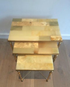 Set of Neoclassical Nesting Tables with Onyx Tops, French, circa 1940
