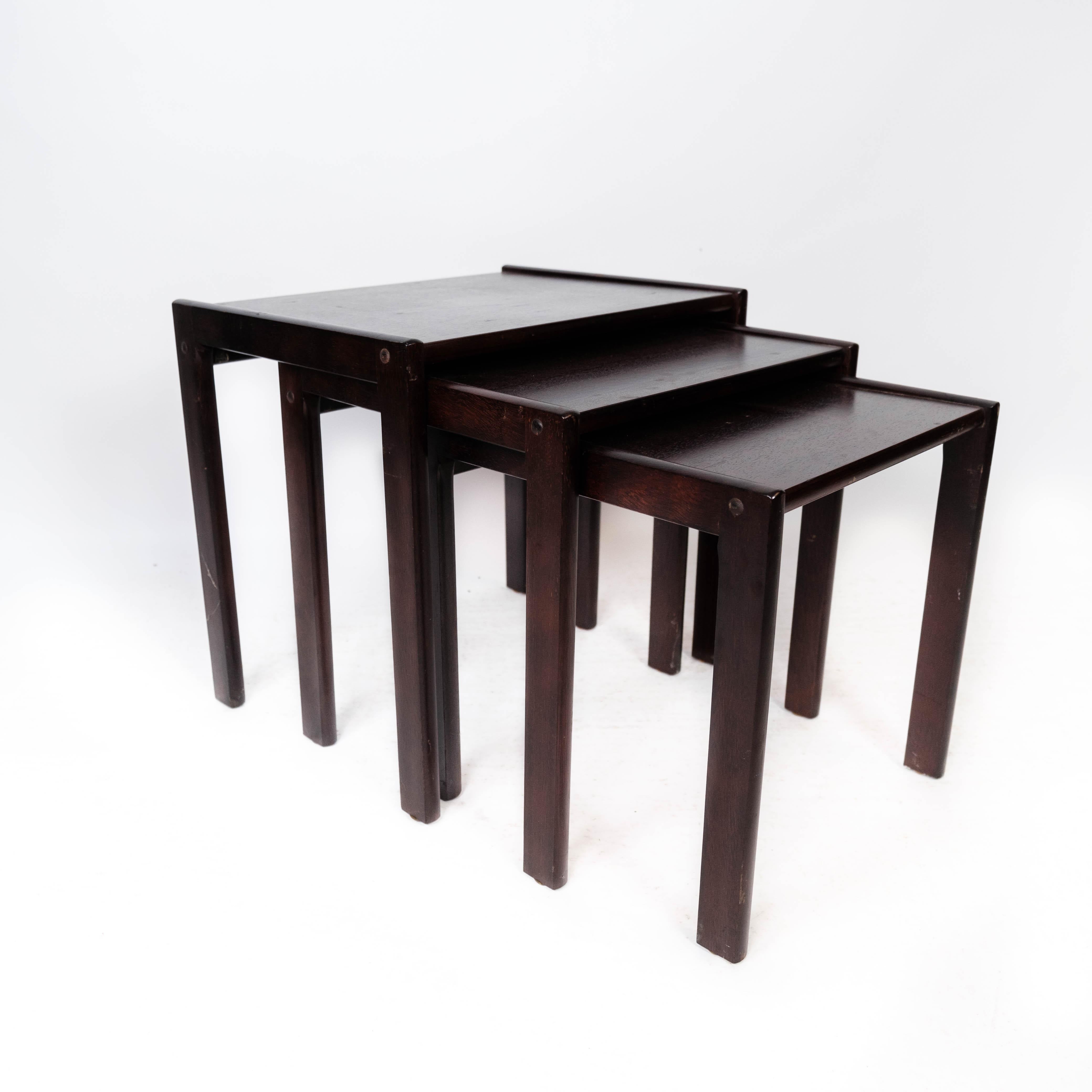 Mid-20th Century Set of Nesting Tables in Dark Wood of Danish Design from the 1960s For Sale