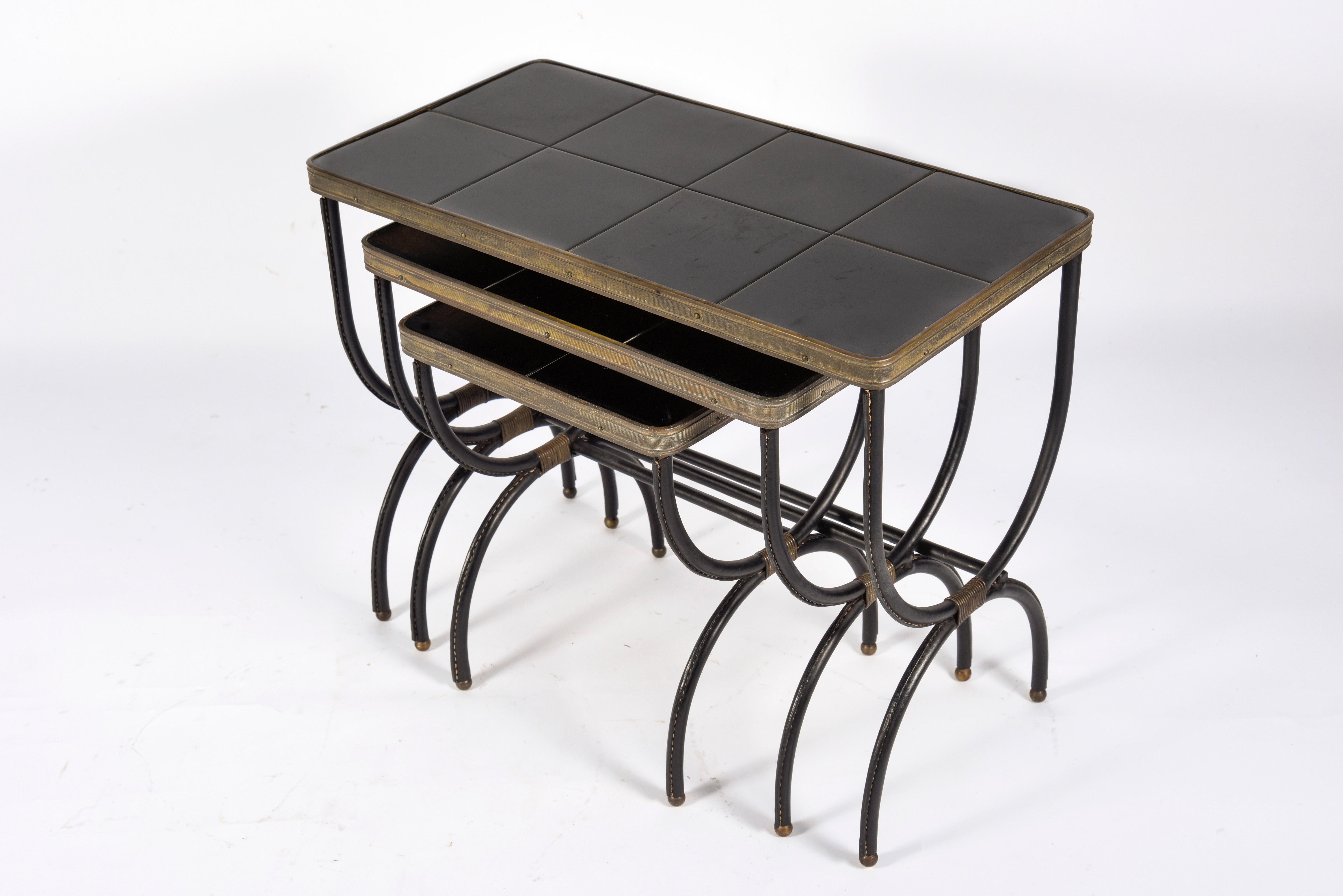 Ceramic Set of Nesting Tables in Stitched Leather by Jacques Adnet For Sale