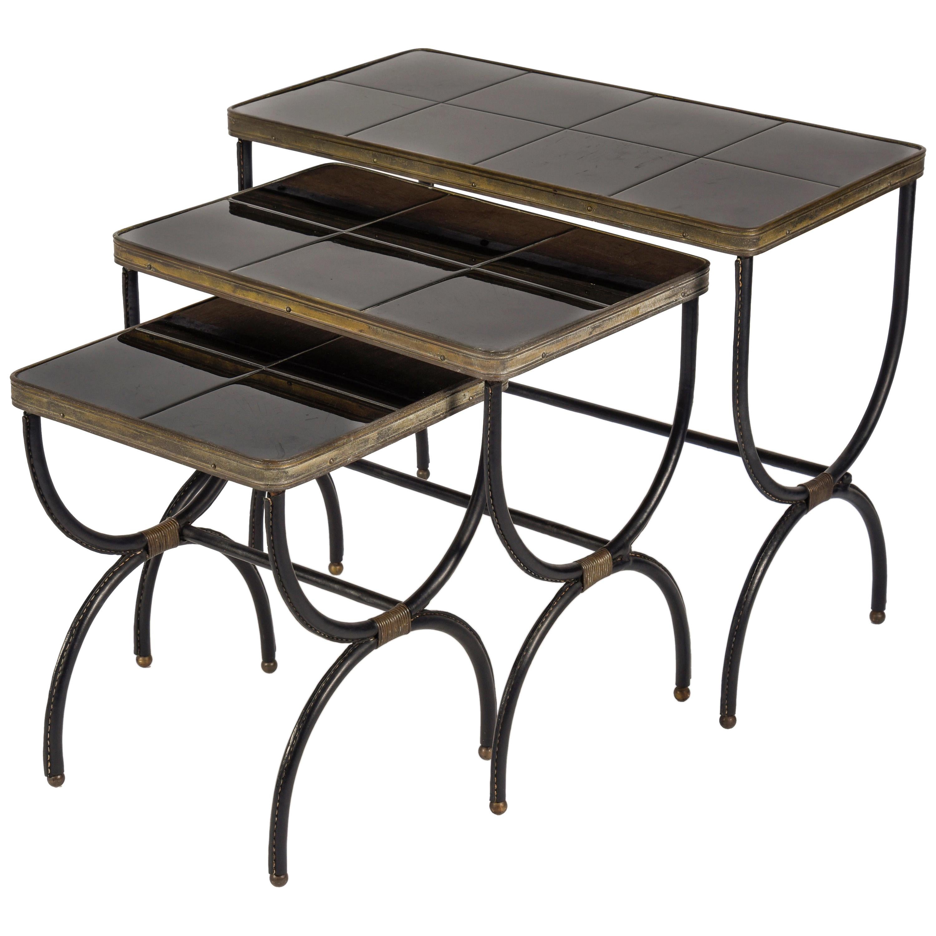 Set of Nesting Tables in Stitched Leather by Jacques Adnet