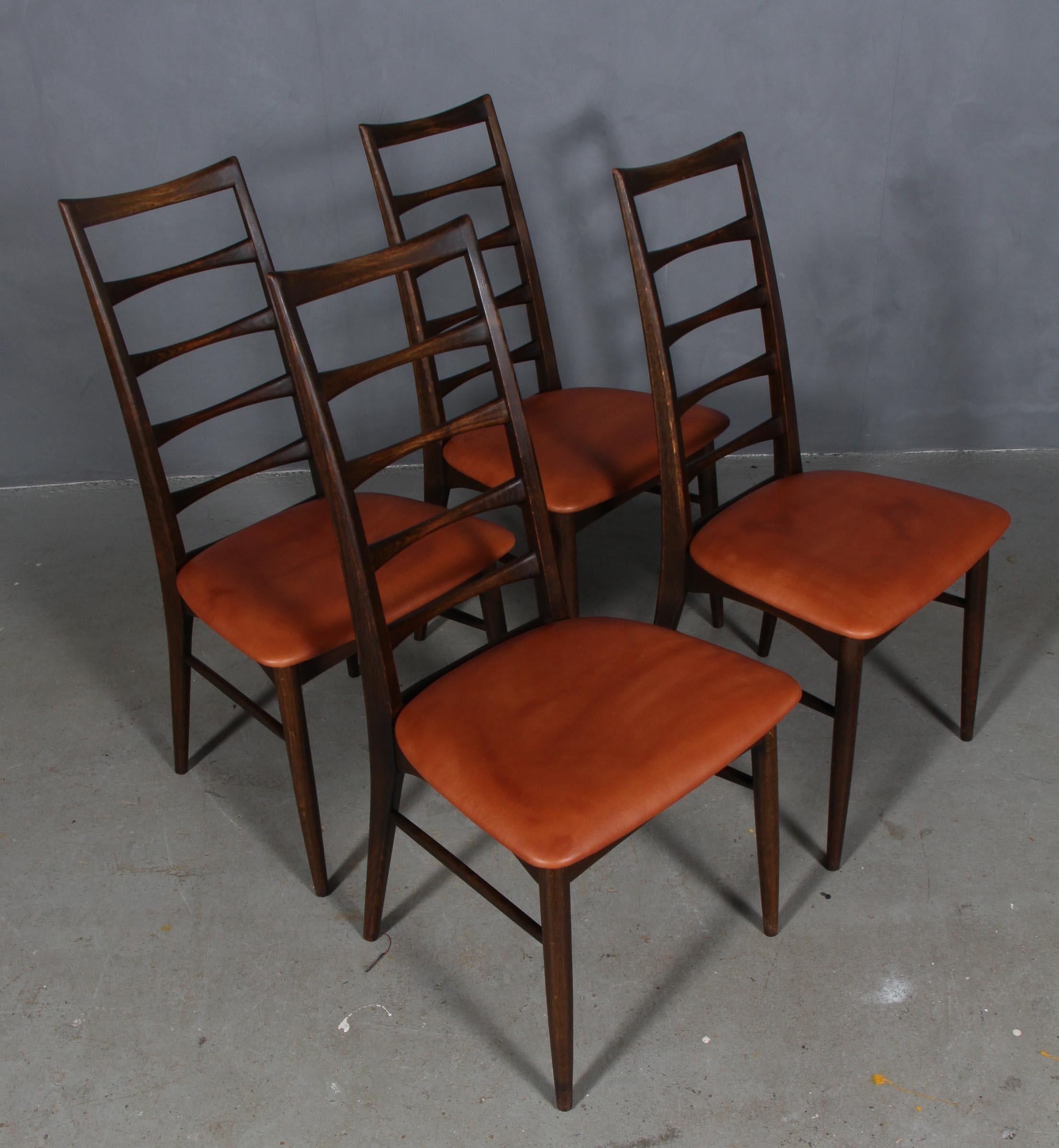 Set of Niels Koefoed dining chairs made in solid smoked oak.

New upholstered in tan aniline leather.

Model Lis, made by Niels Koefoeds Møbelfabrik Hornslet, 1960s.

