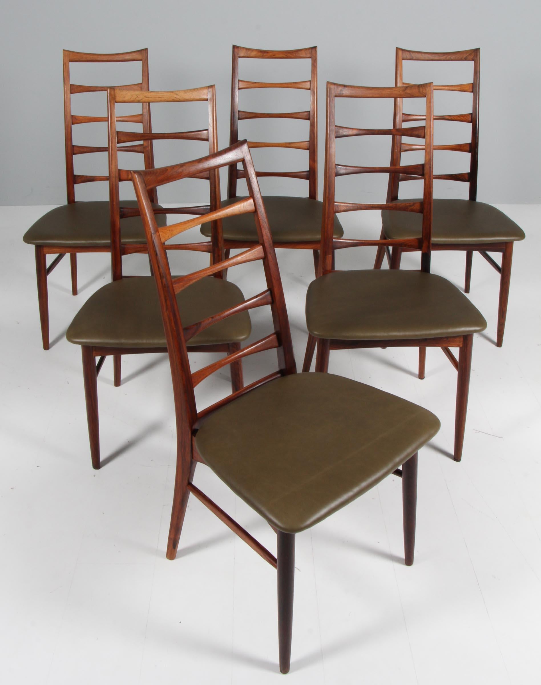 Set of Niels Koefoed dining chairs made in rosewood

New upholstered with green Envy leather from Arne Sørensen.

Model Lis, made by Niels Koefoeds Møbelfabrik Hornslet, 1960s.

