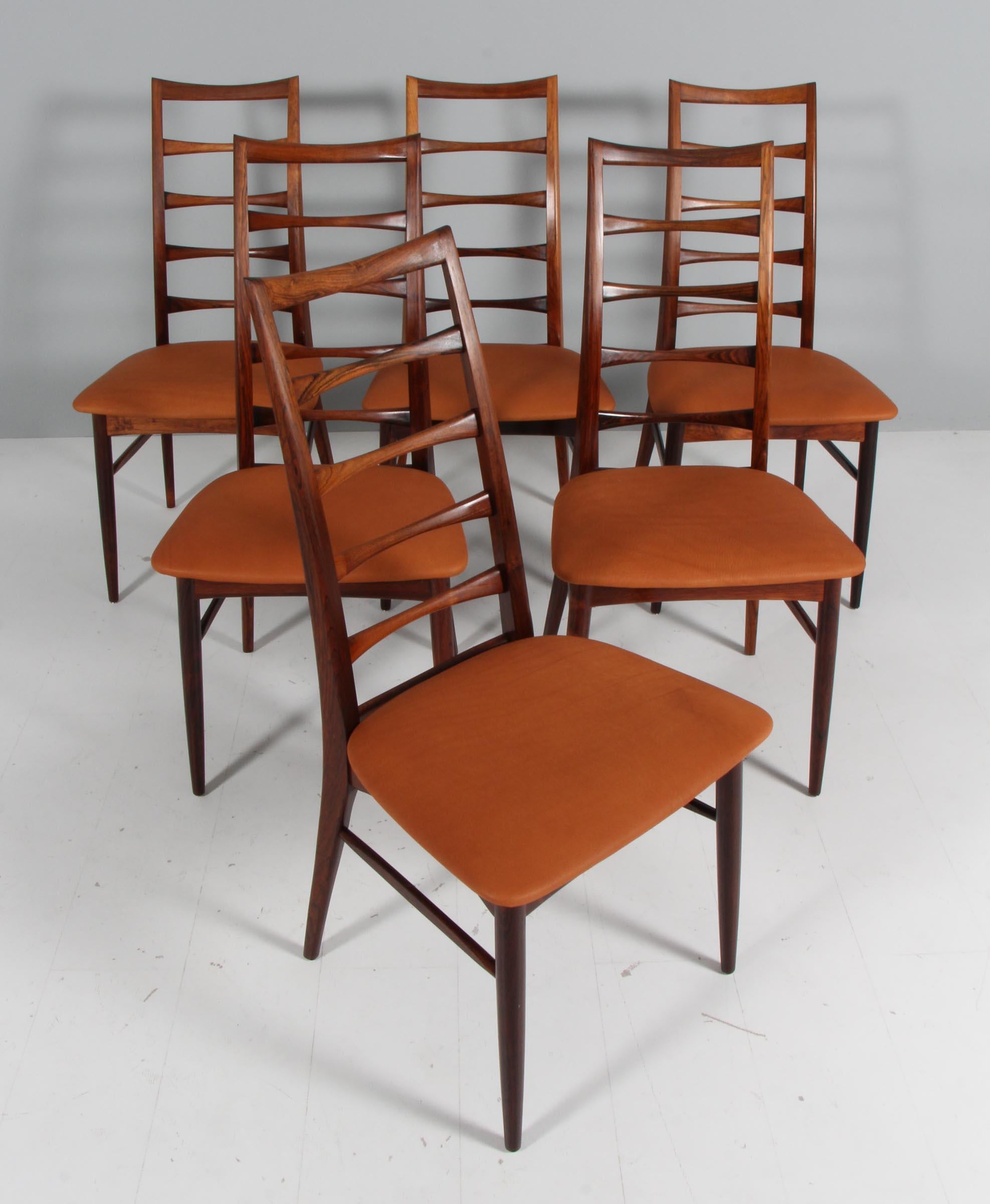 Set of Niels Koefoed dining chairs made in rosewood

New upholstered with tan coloured full grain aniline leather.

Model Lis, made by Niels Koefoeds Møbelfabrik Hornslet, 1960s.

