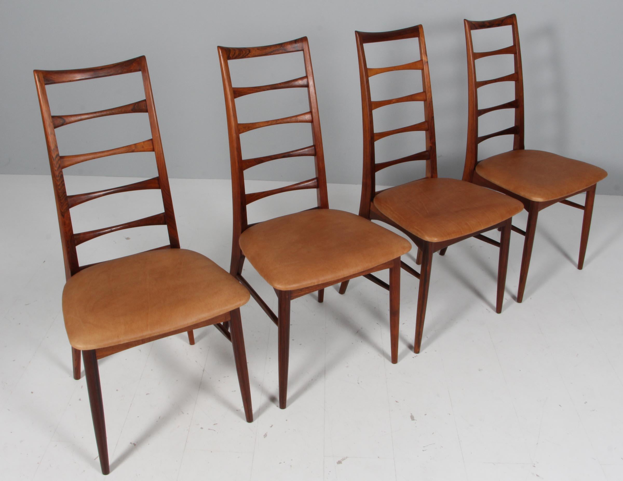 Set di sedie da pranzo Niels Koefoed in palissandro.

Nuovo rivestimento in pelle anilina pieno fiore di colore marrone.

Modello Lis, realizzato da Niels Koefoeds Møbelfabrik Hornslet, 1960.

